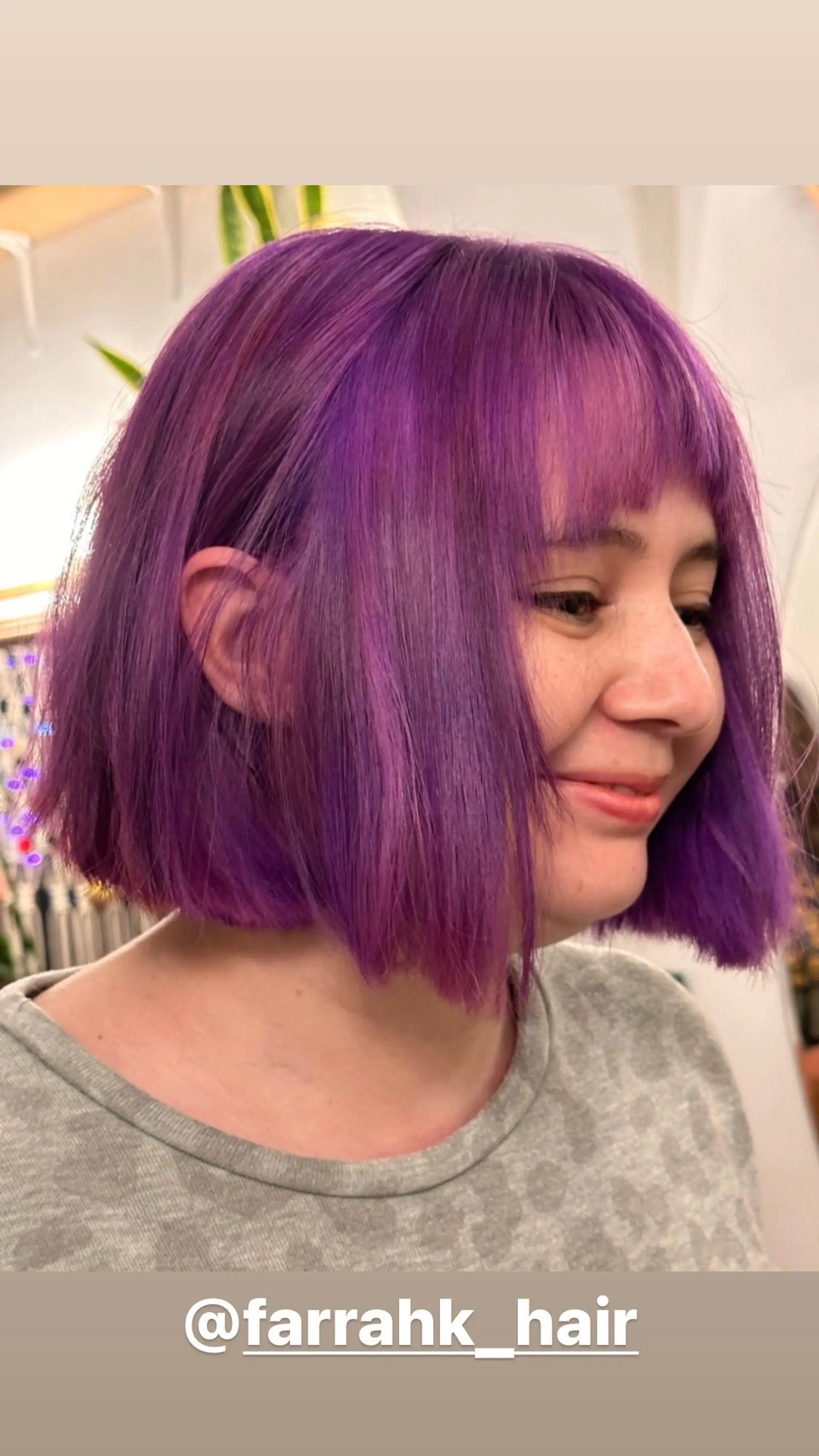 A short, straight blunt bob with a fringe. 1