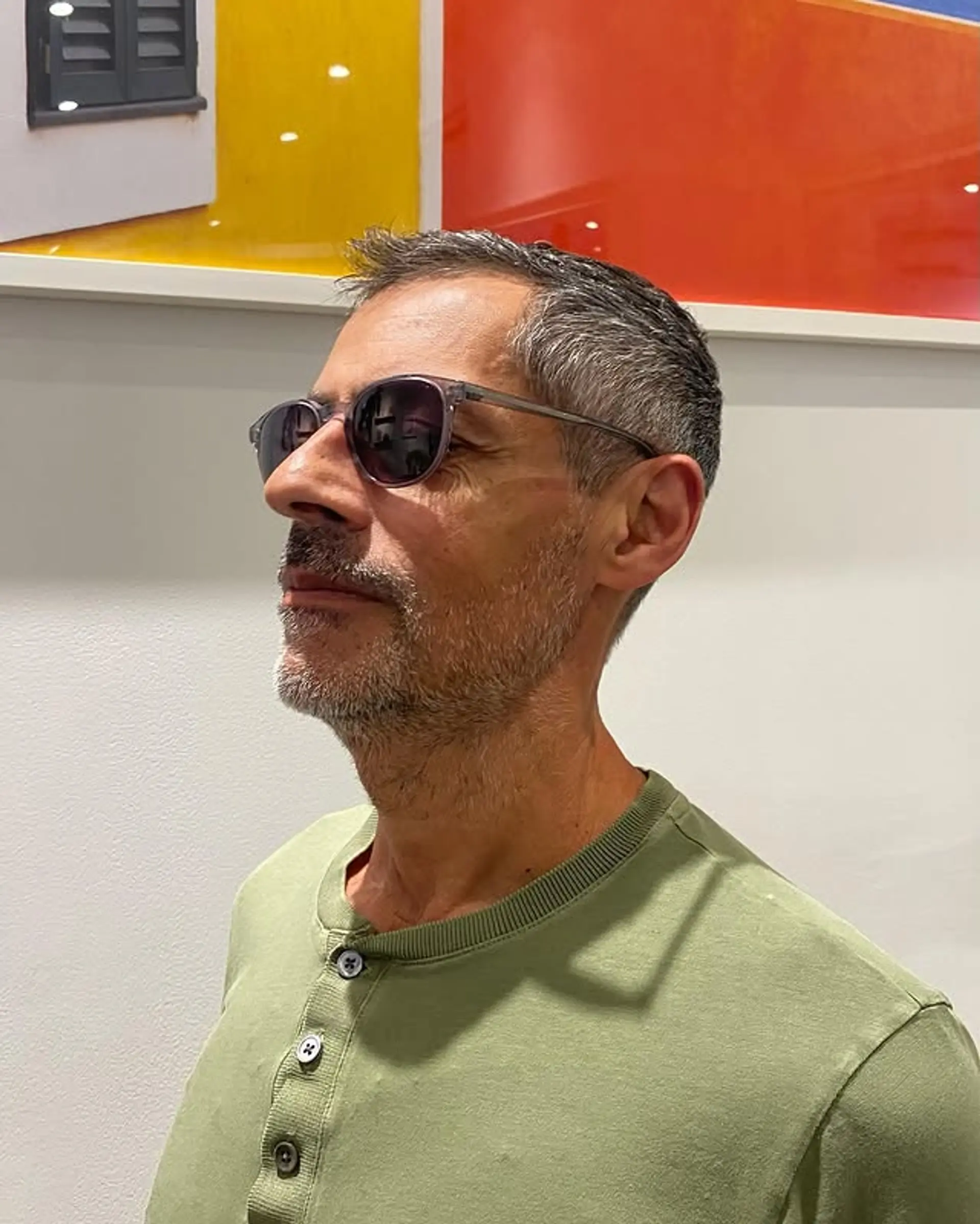 A neatly tapered short haircut. 1