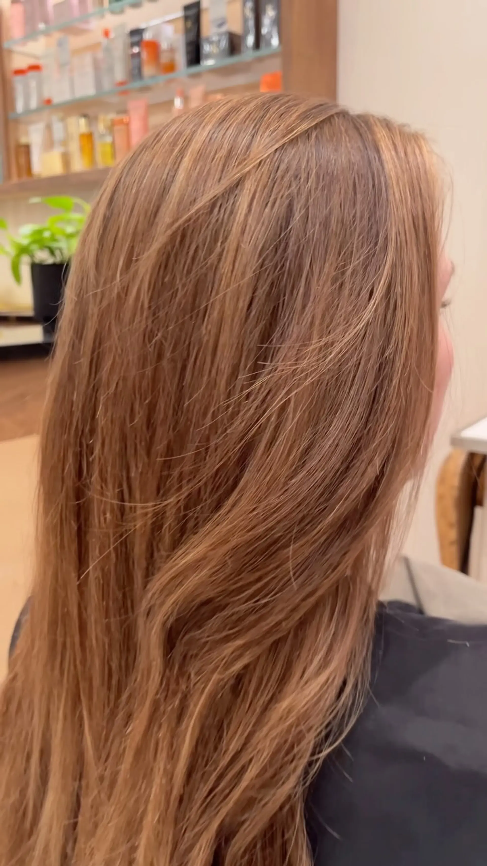 Long, smooth light brown hair featuring seamless caramel and honey highlights blended with lowlights for natural dimension. 1