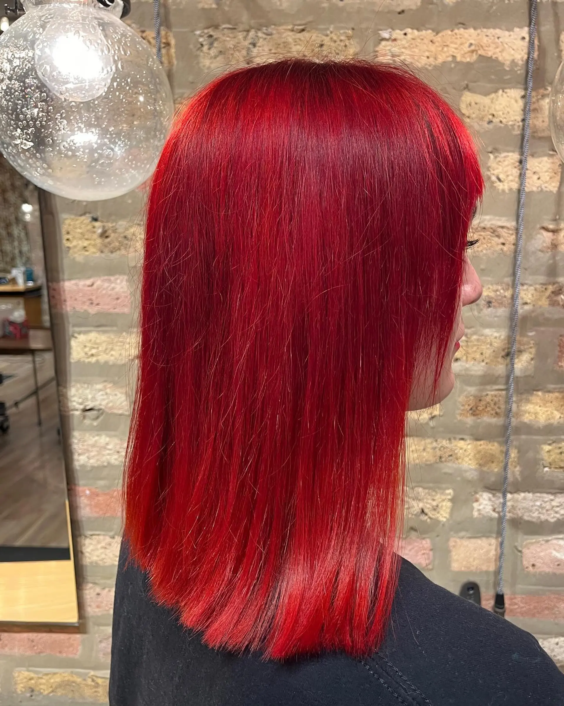 A long, straight hairstyle with subtle layers for added movement and shape. 2