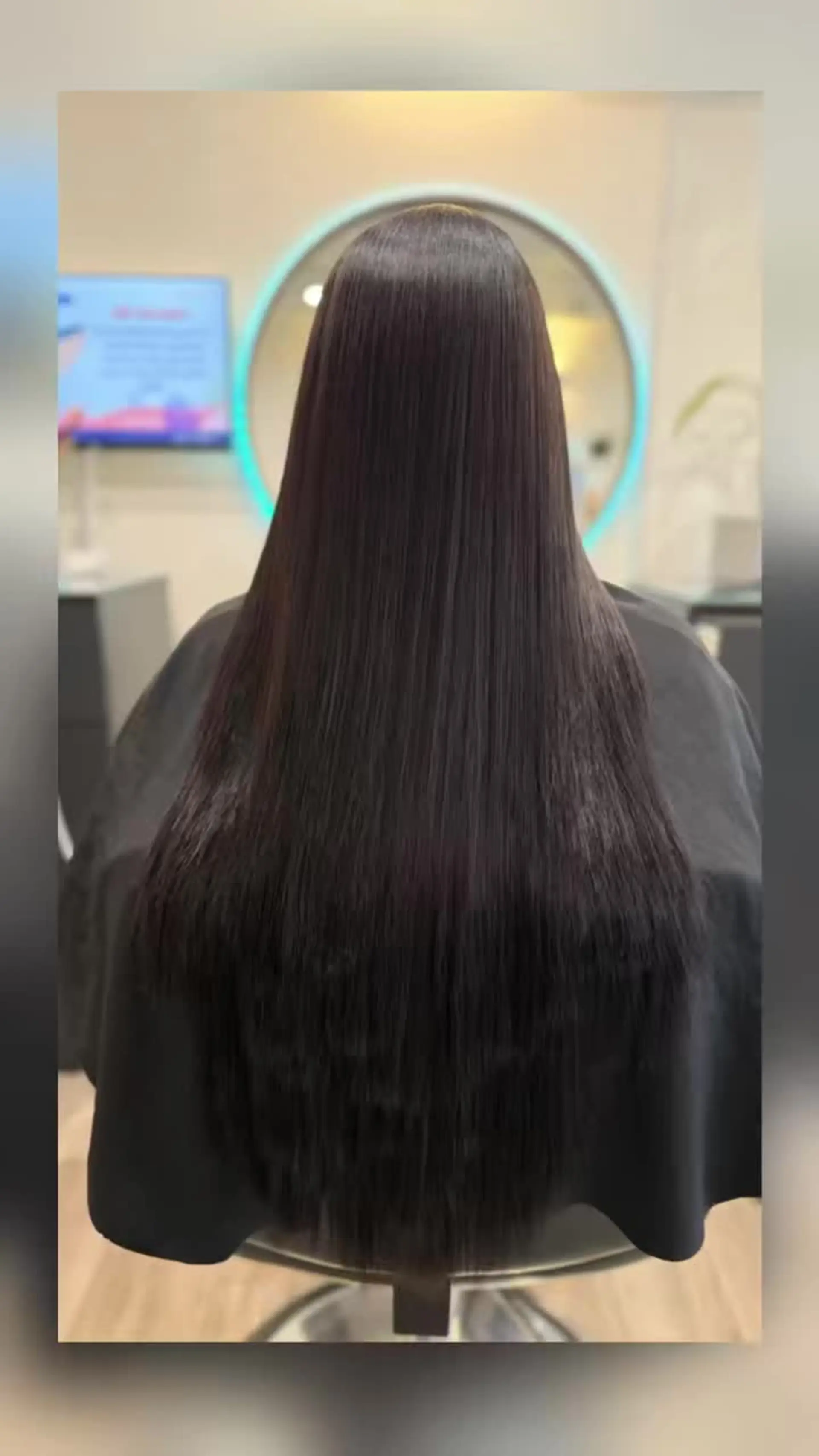 Ultra-sleek, pin-straight long dark hair with a glossy, polished glass-like finish. 1