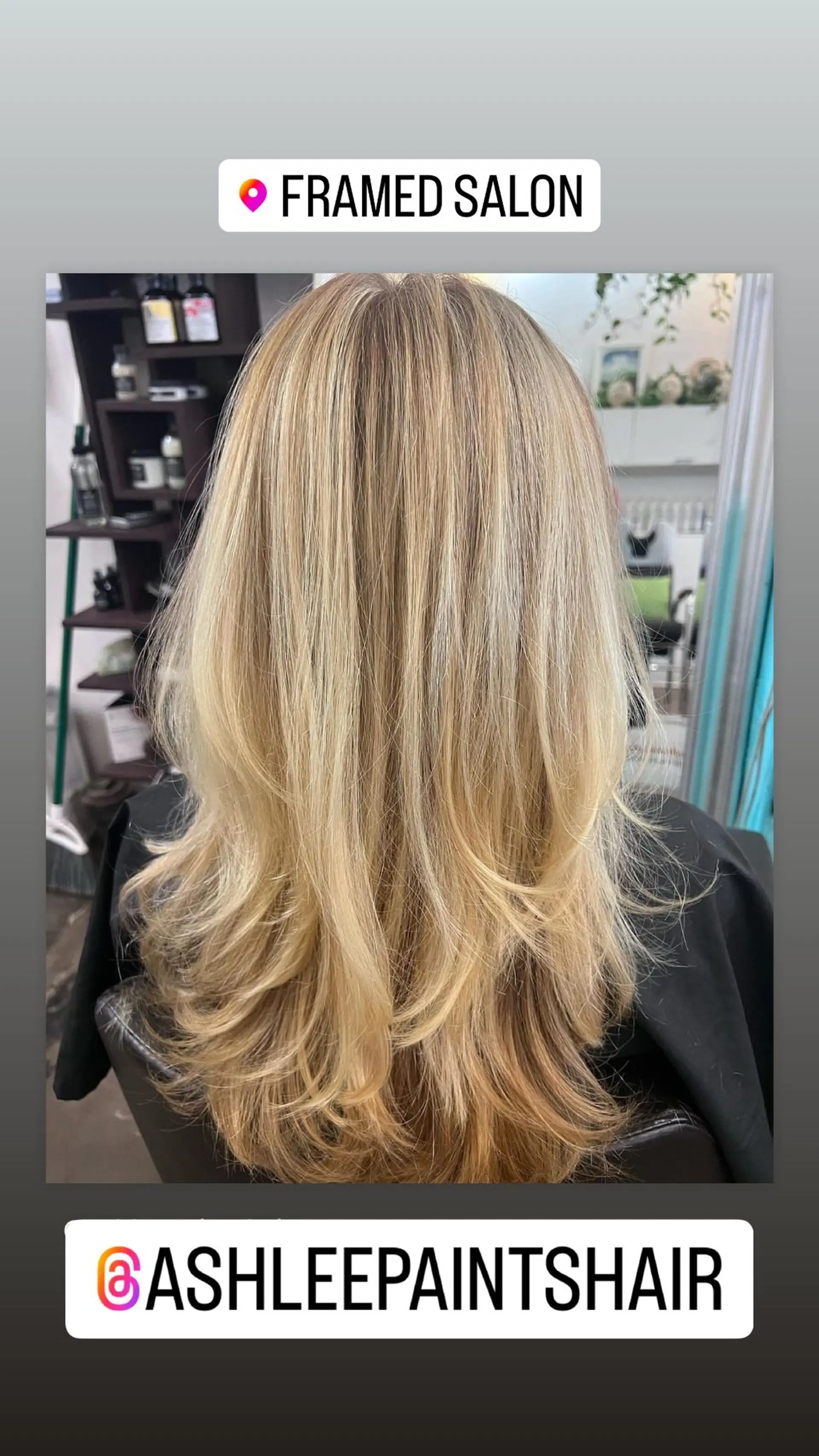 A long layered haircut with face-framing layers, styled to accentuate the hair's movement and texture. 1