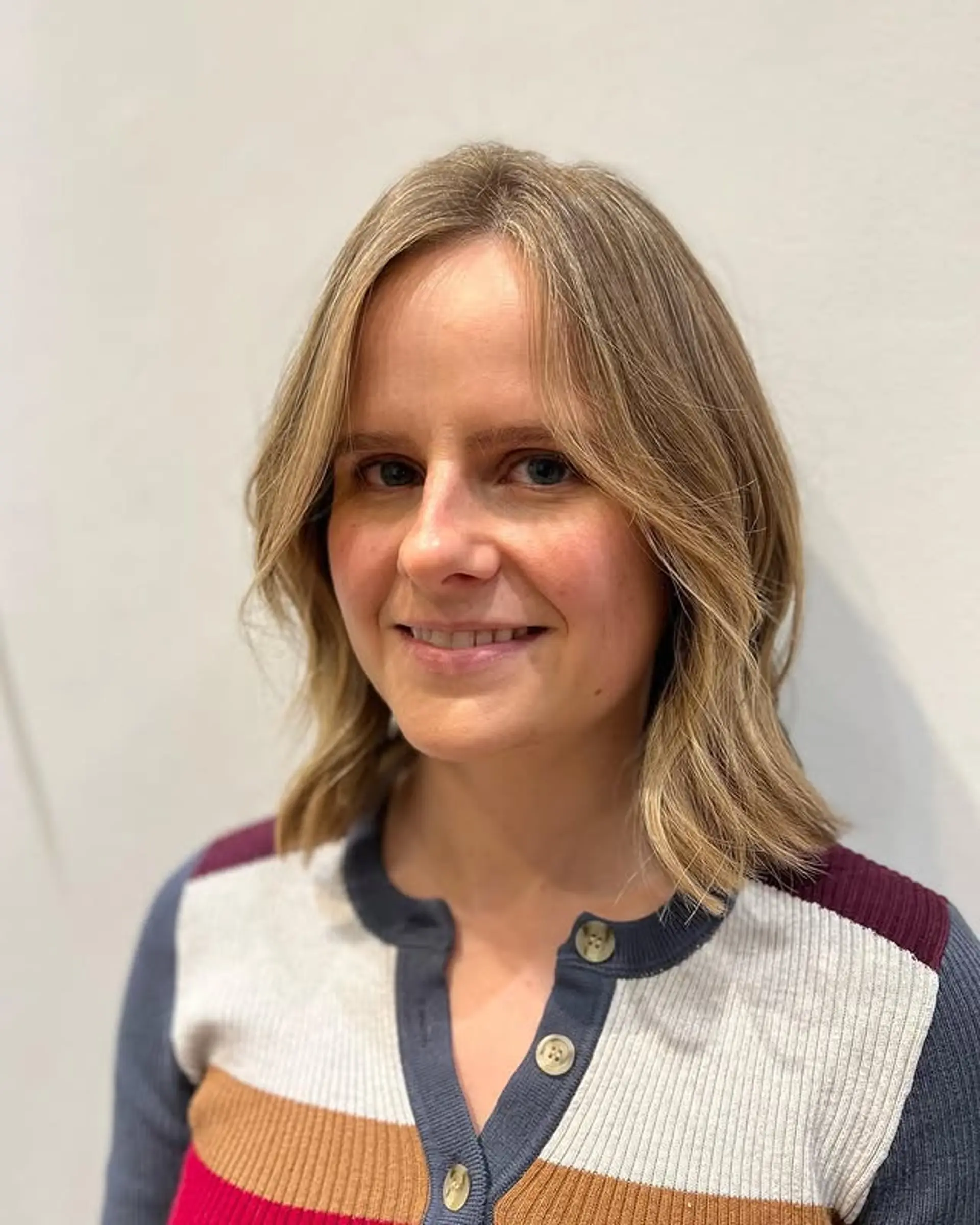 A wavy lob with face-framing layers for a beachy, effortless look. 1