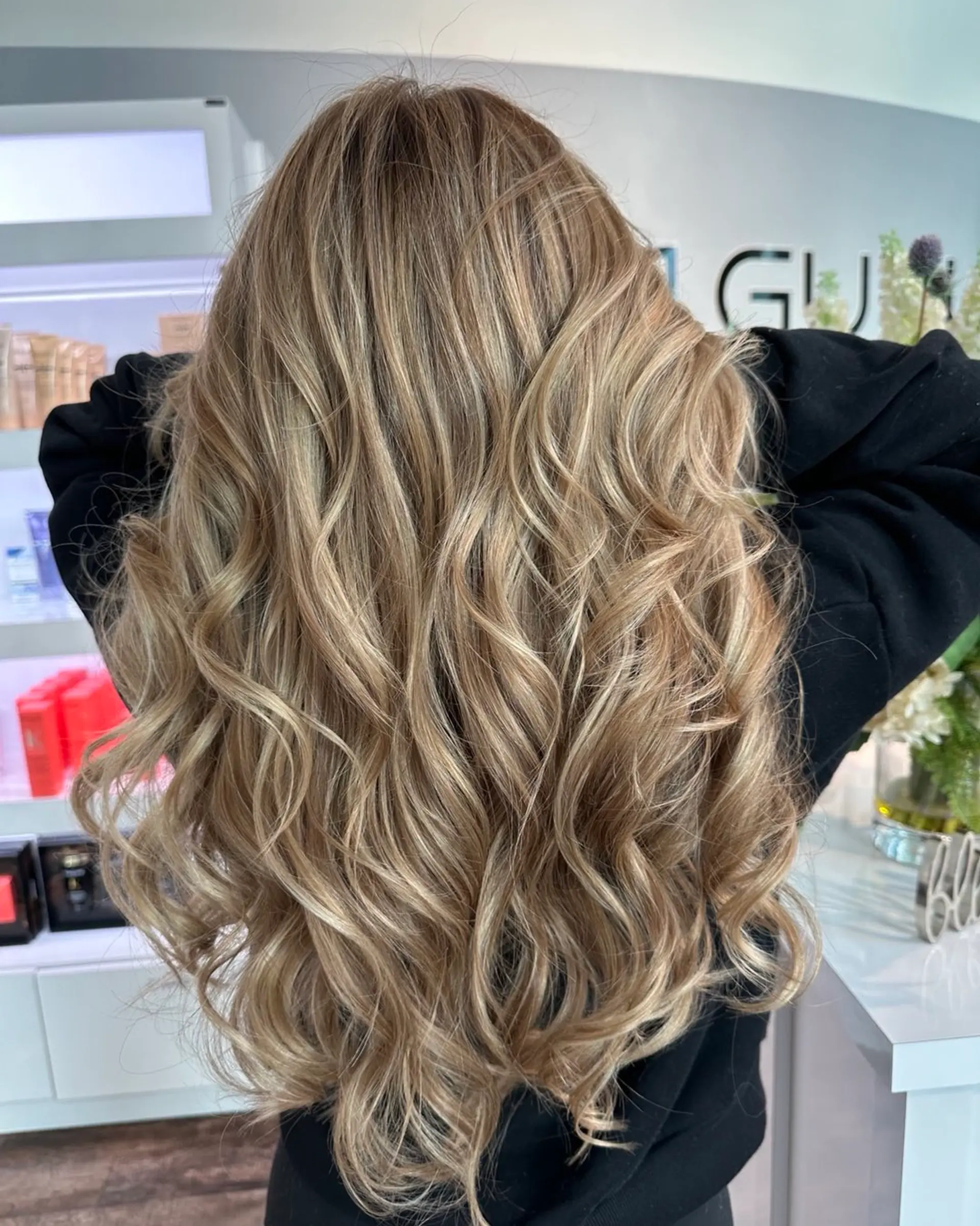 Long, layered waves with a blonde balayage. 1