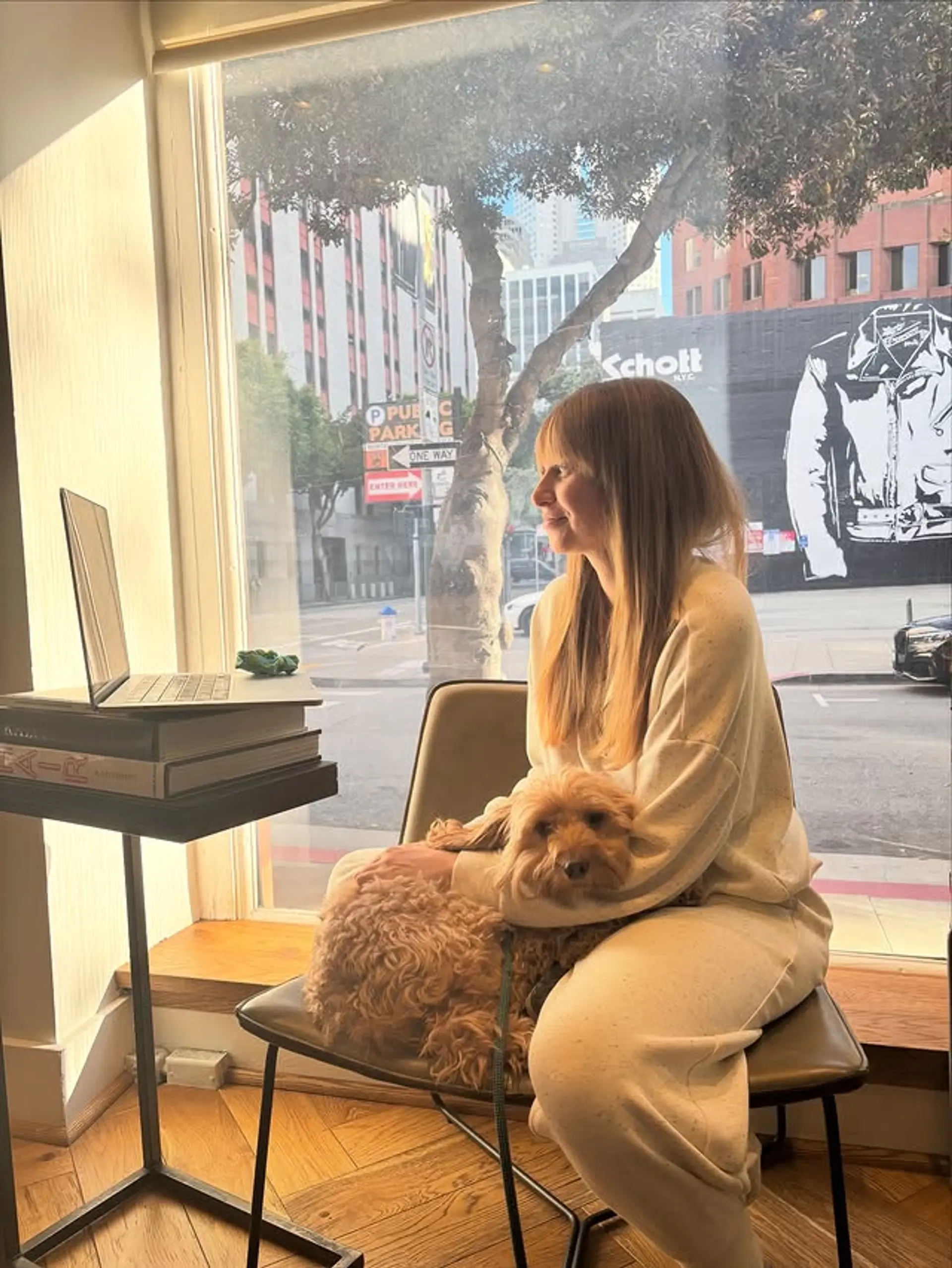 Long layered bronde hairstyle with wispy bangs and face-framing layers. 1