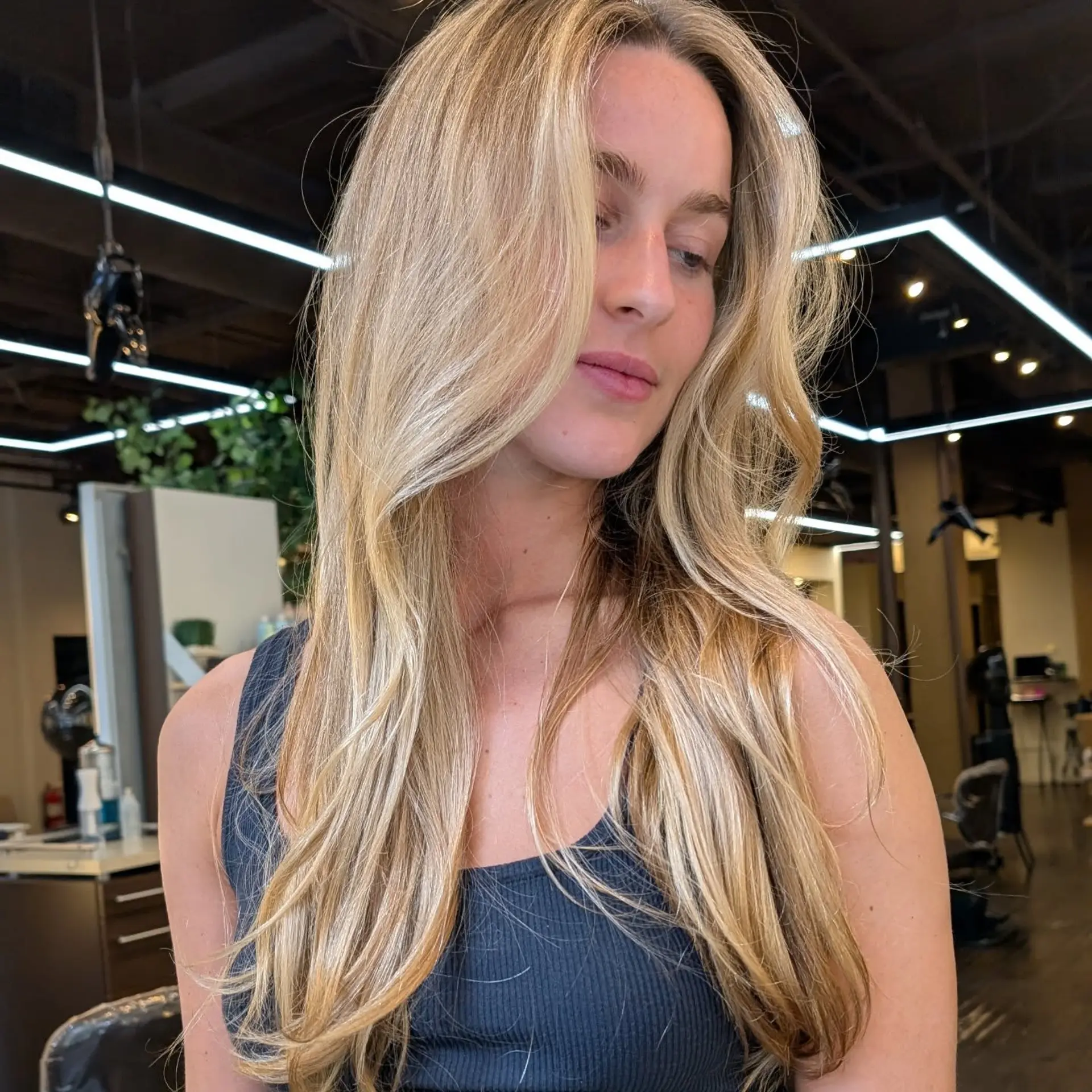 Long, straight hair with a beachy blonde balayage. 1