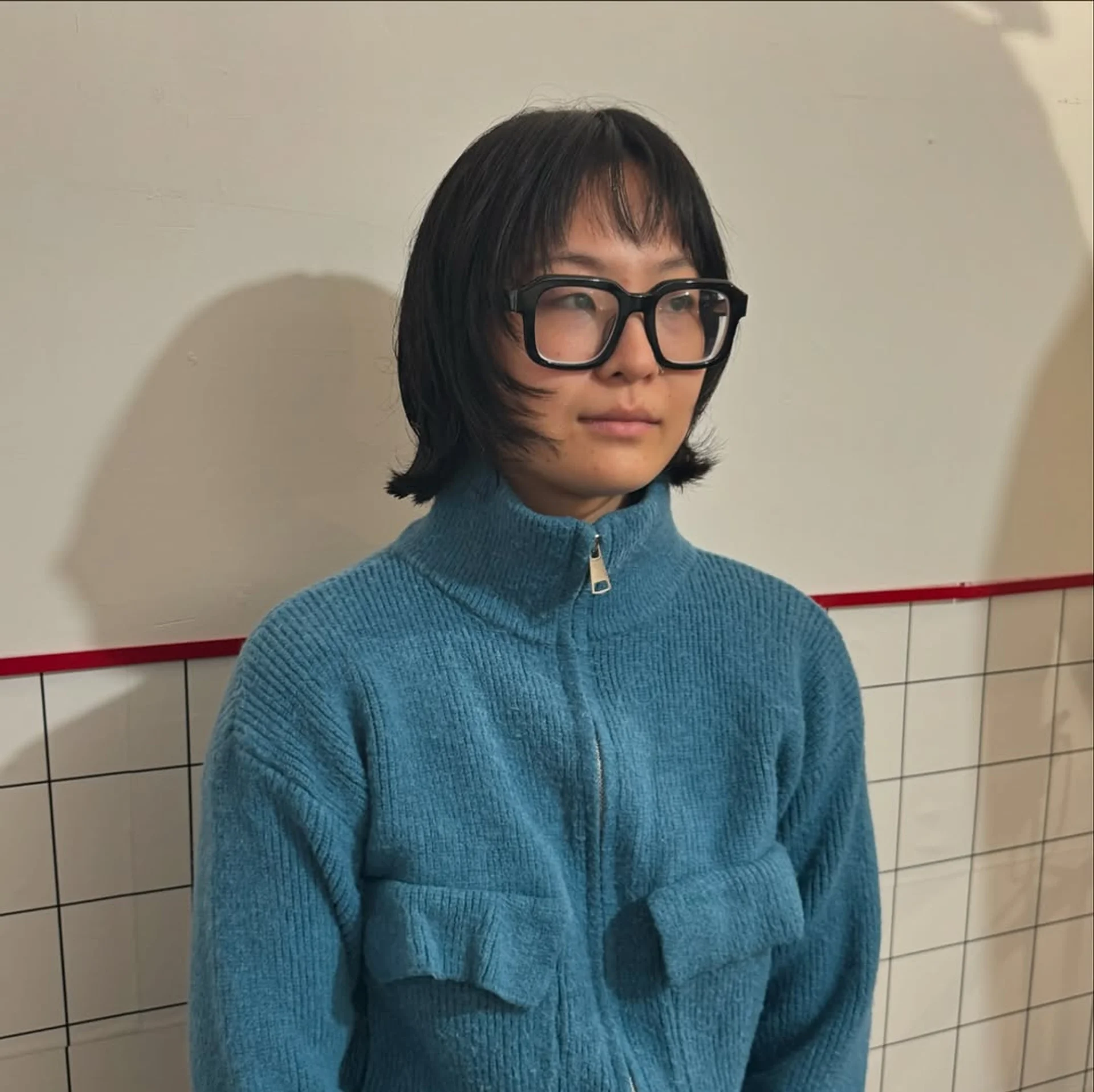 Beautiful Japanese Layered Cut with Bangs by Salon87 in Brooklyn, featuring a breezy wash-and-go aesthetic perfect for new mothers. - Preview 1