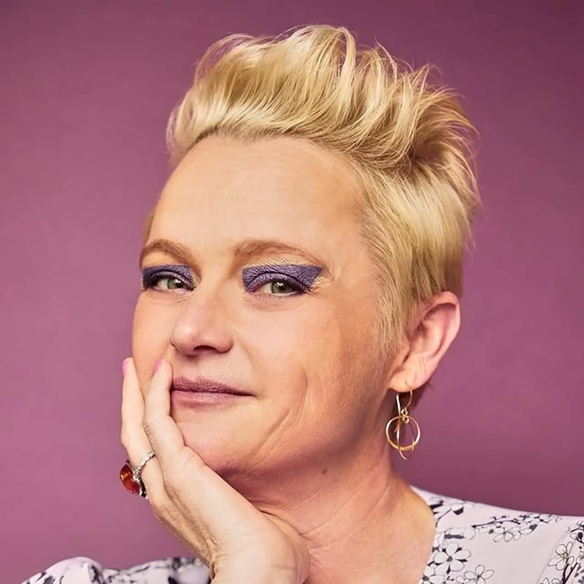 A textured and layered pixie cut with a modern and edgy style. 1