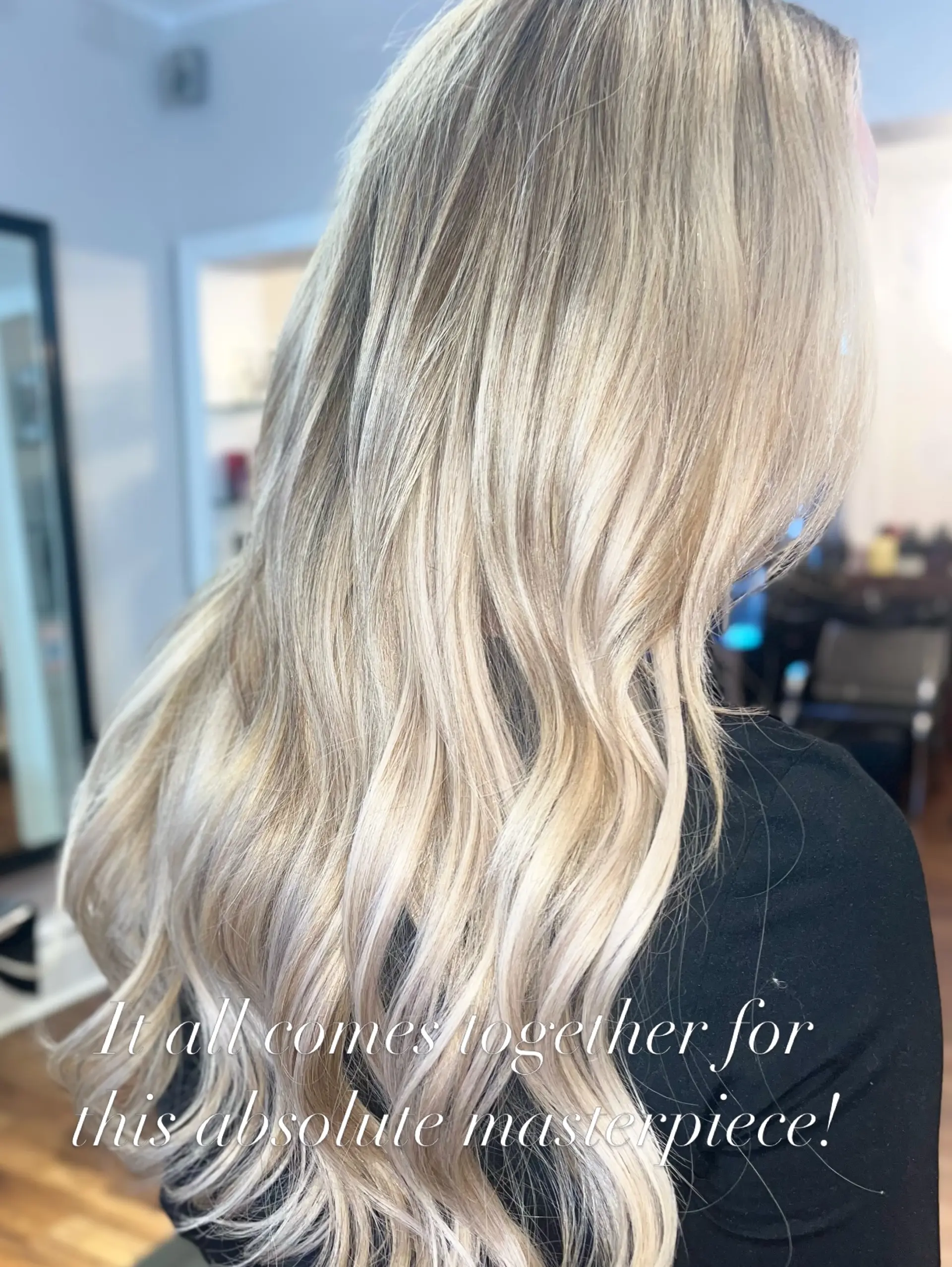 Long, luminous dimensional blonde hair styled in soft, loose waves cascading down the back. 1