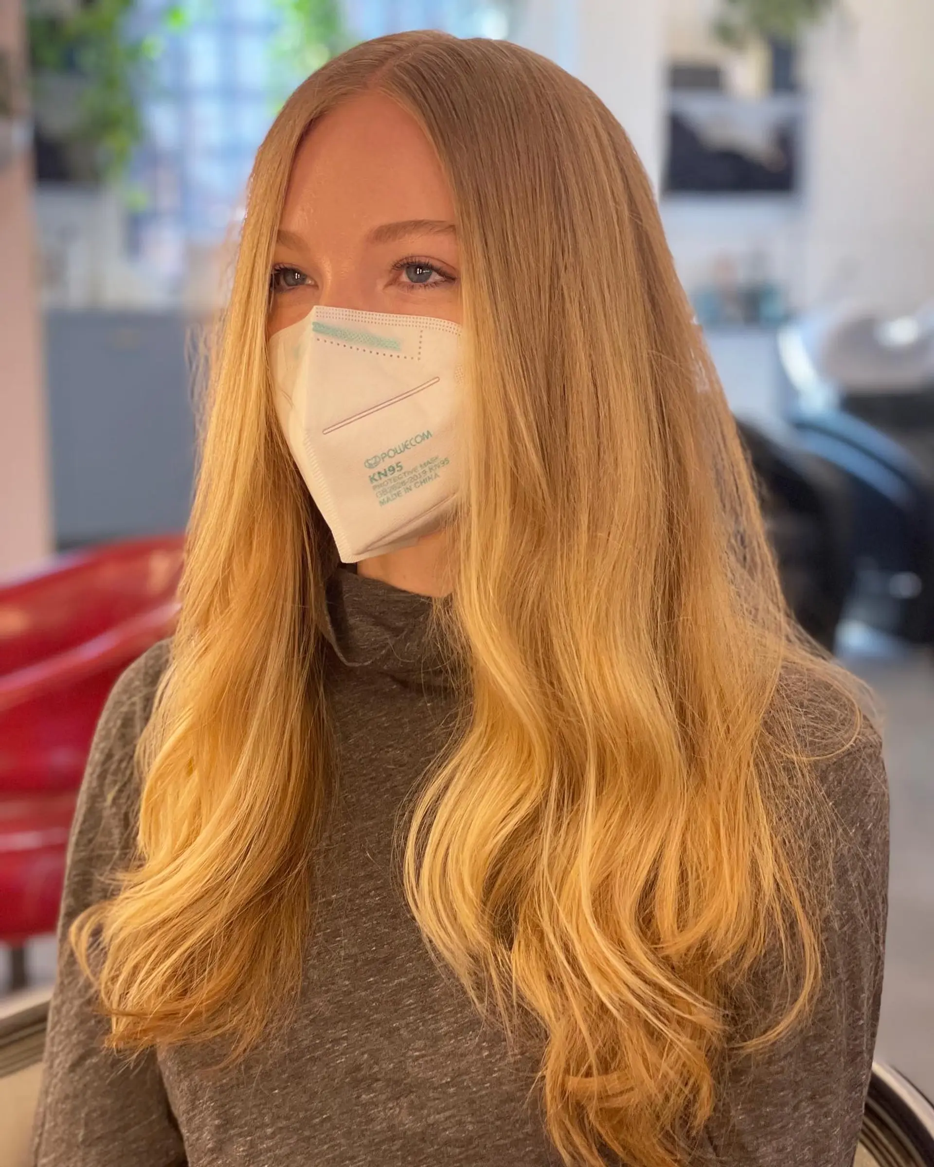 Long, wavy hair with subtle layering for movement and volume. 1