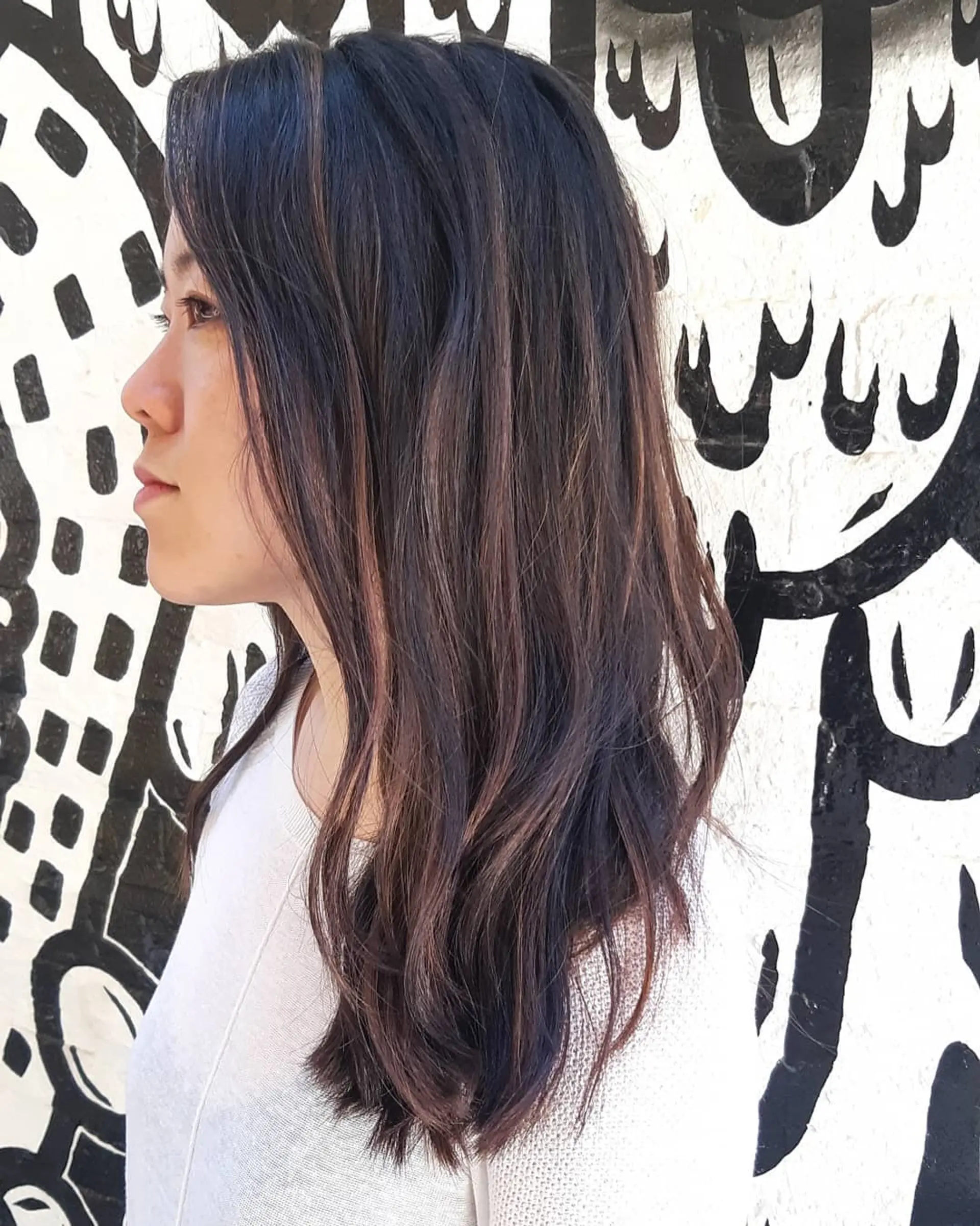 Medium length wavy hair with a chocolate brown balayage. 1