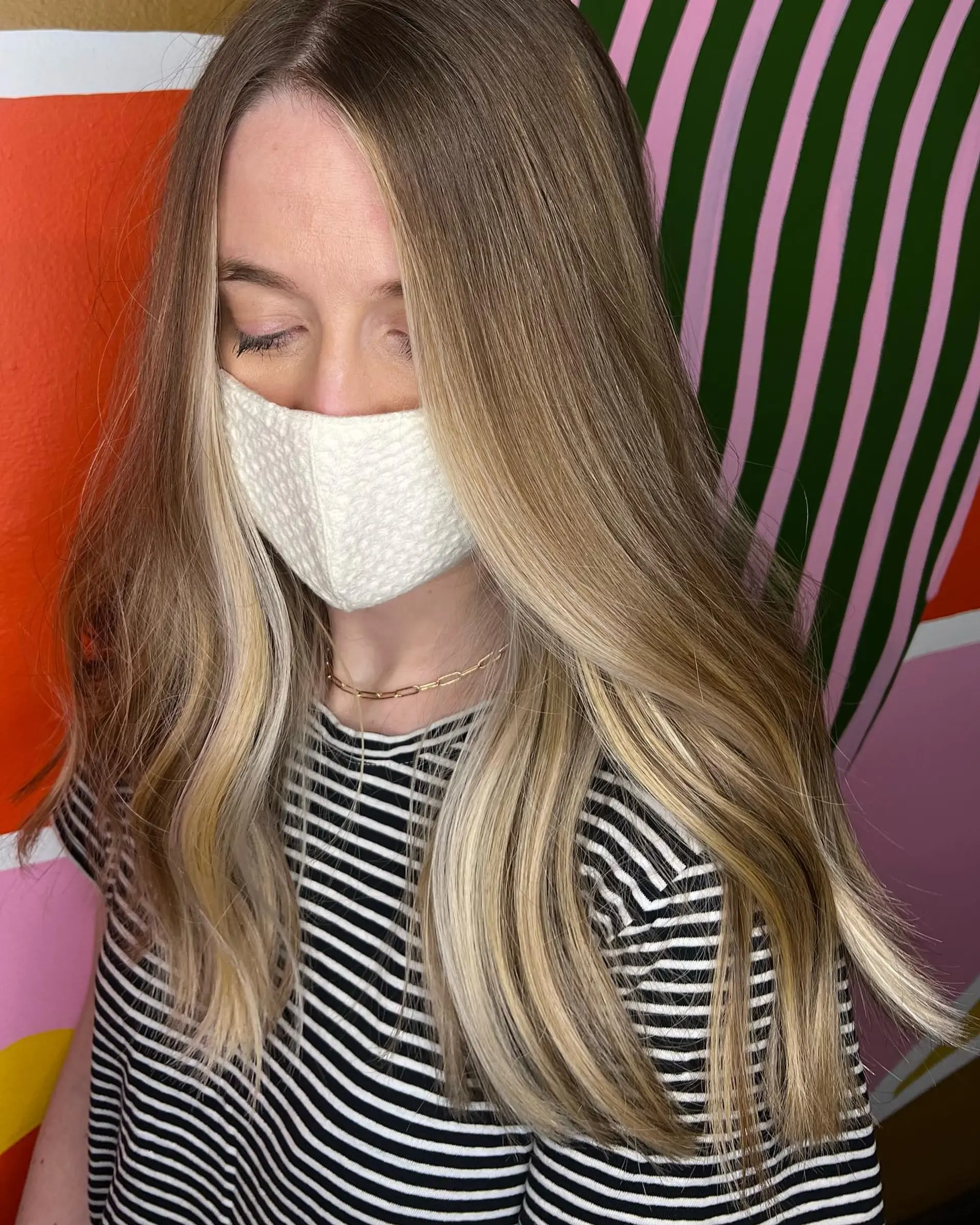 Long, smooth hair featuring dimensional beige blonde balayage highlights with bright face-framing pieces. 1