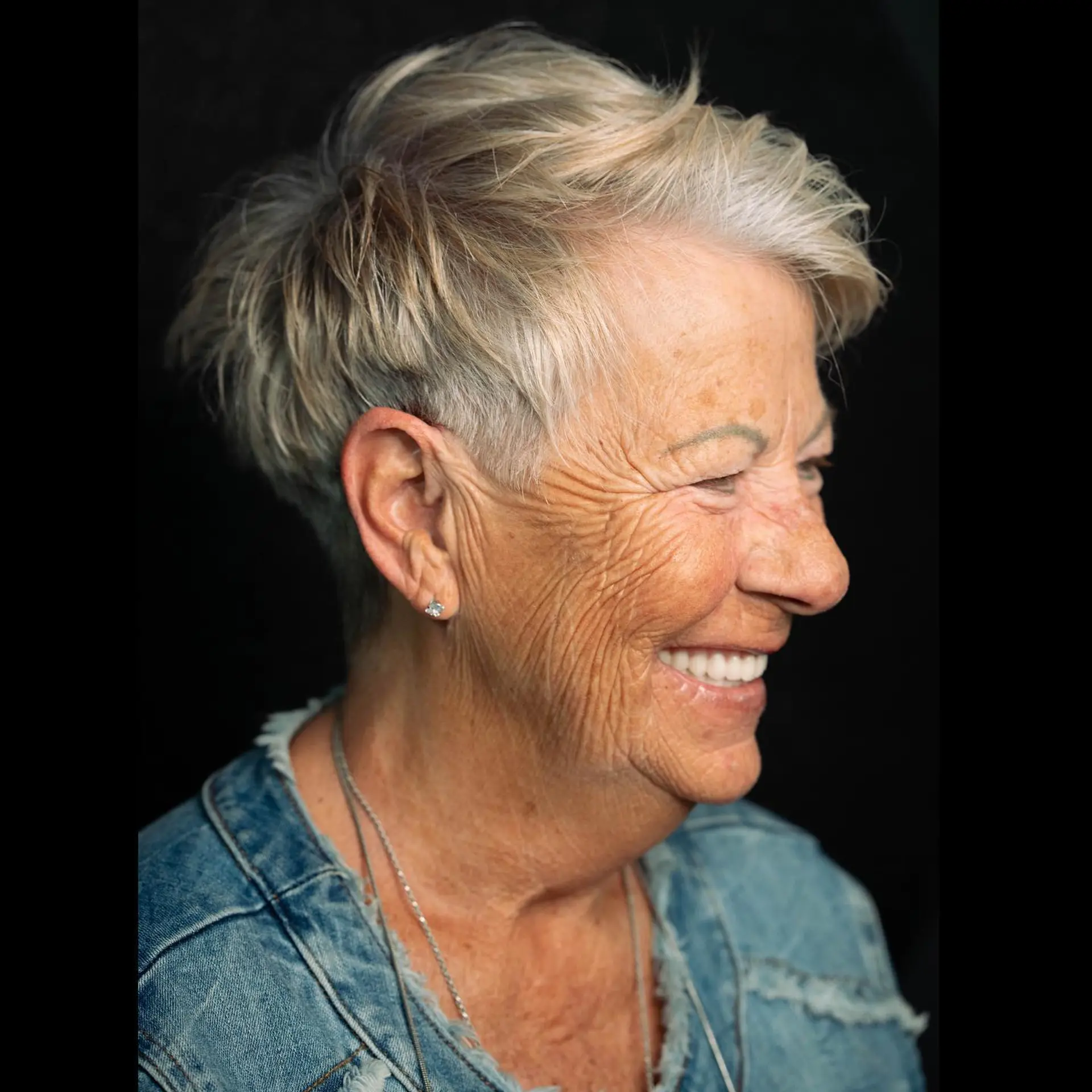 A short, layered, and textured pixie cut. 1