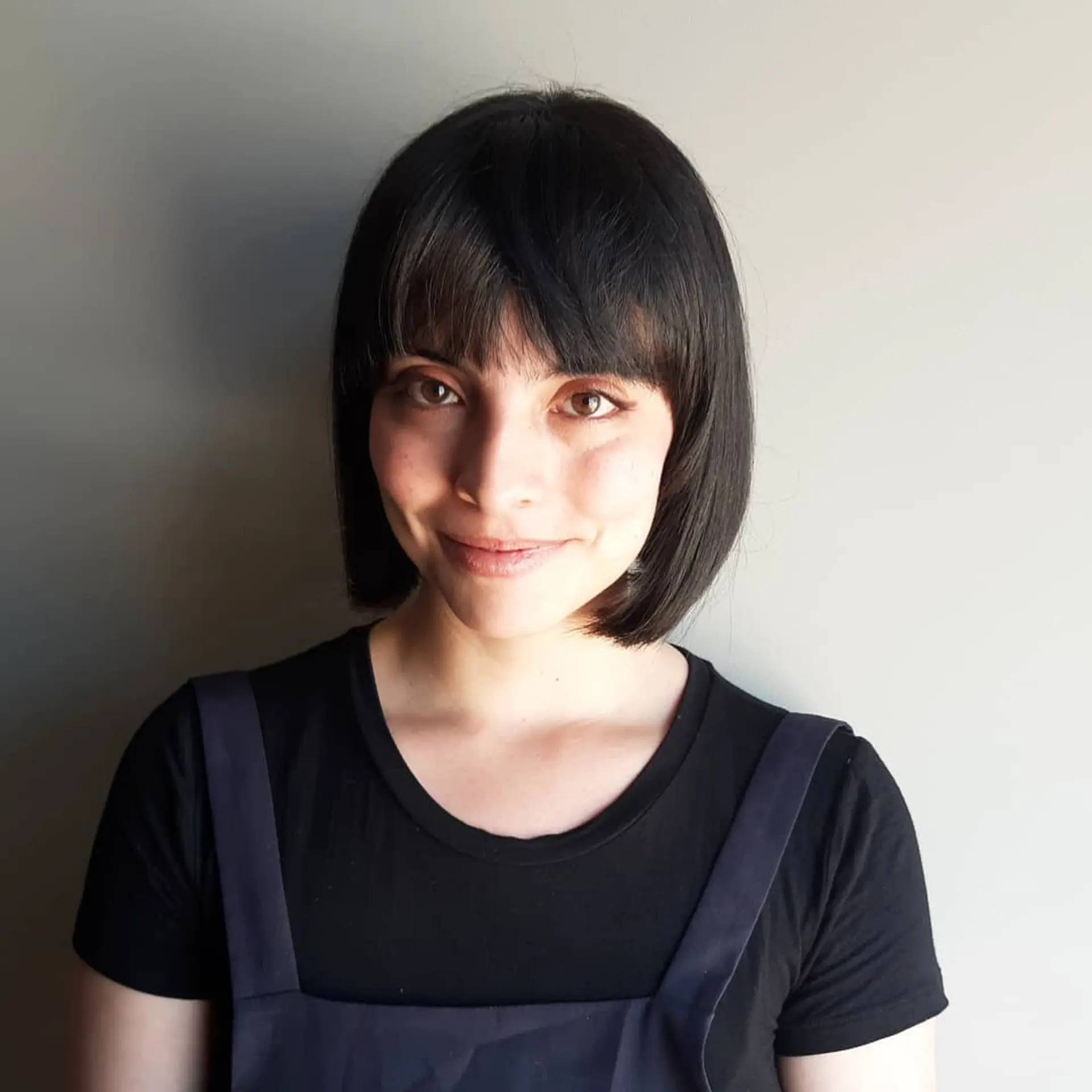 A modern French bob with blunt bangs. 2