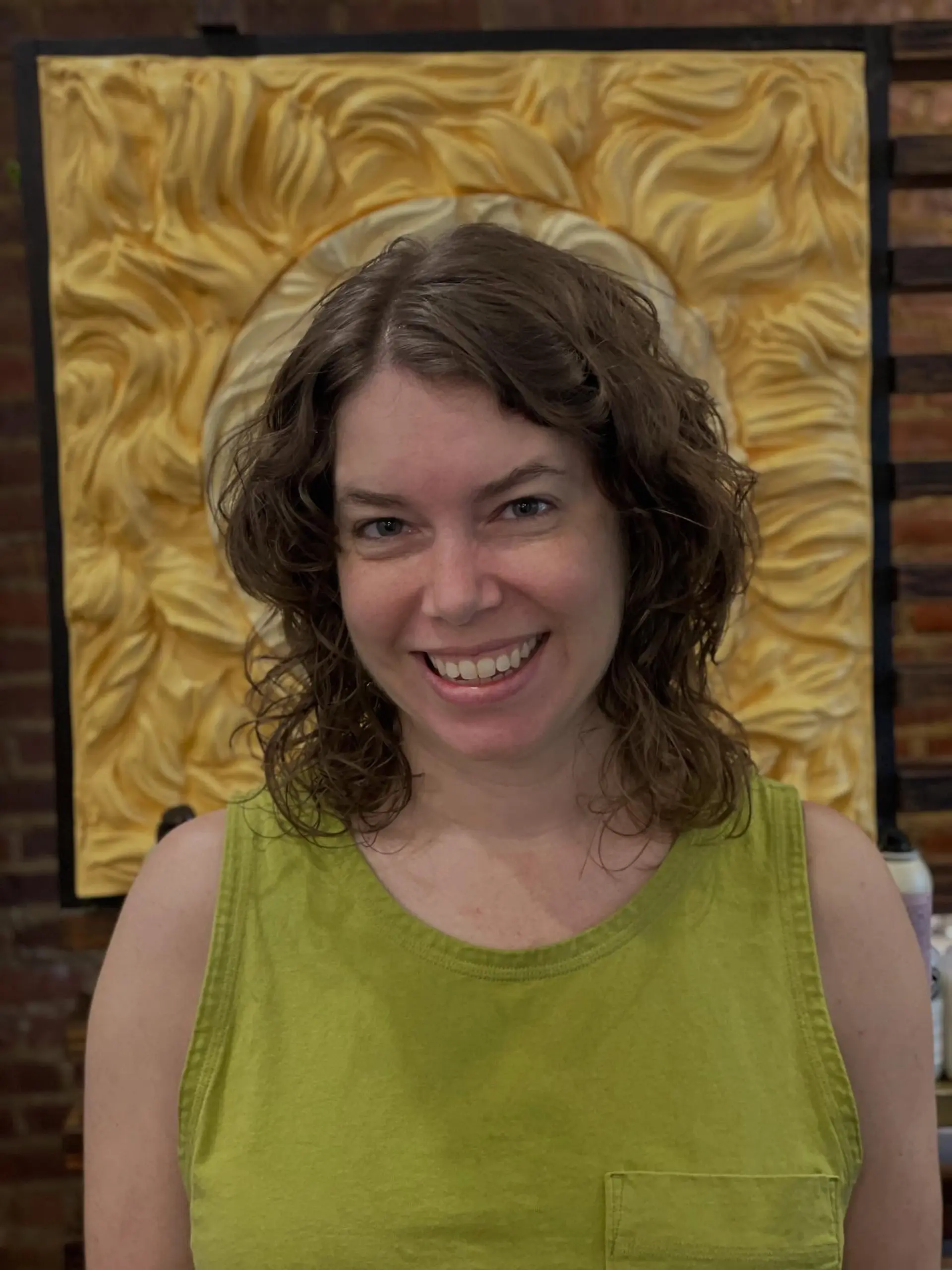 A textured curly shag haircut with shoulder-length layers and soft face-framing fringe. 1