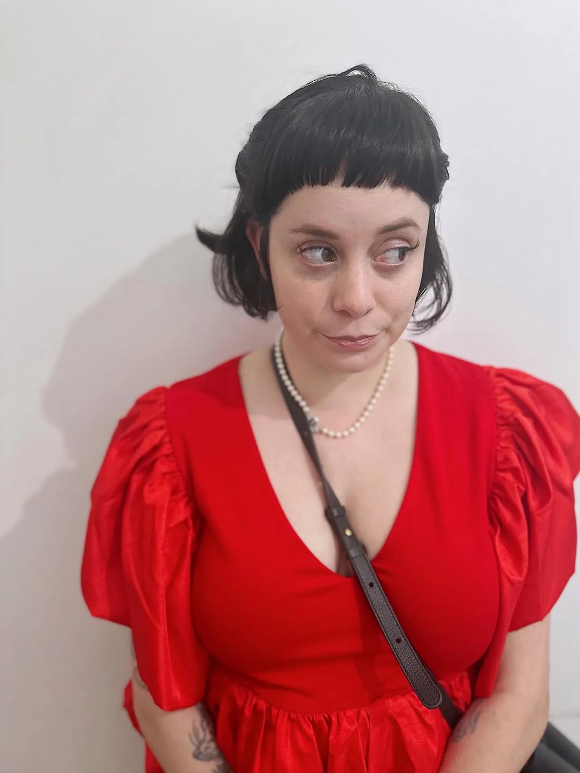Short auburn pixie cut with blunt micro bangs above the eyebrows. - Preview 1