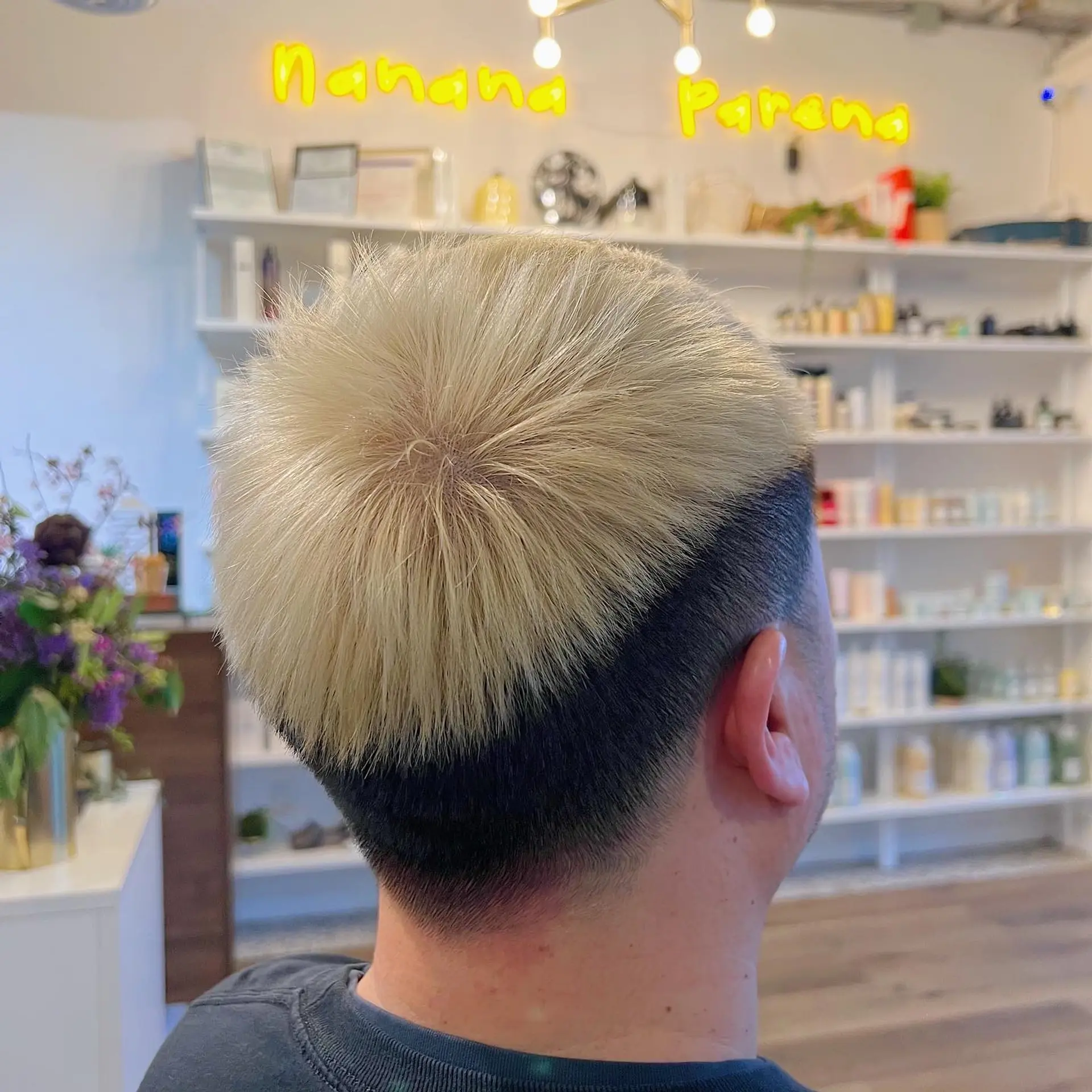 A short textured crop with faded sides and a bold two-tone color. 2