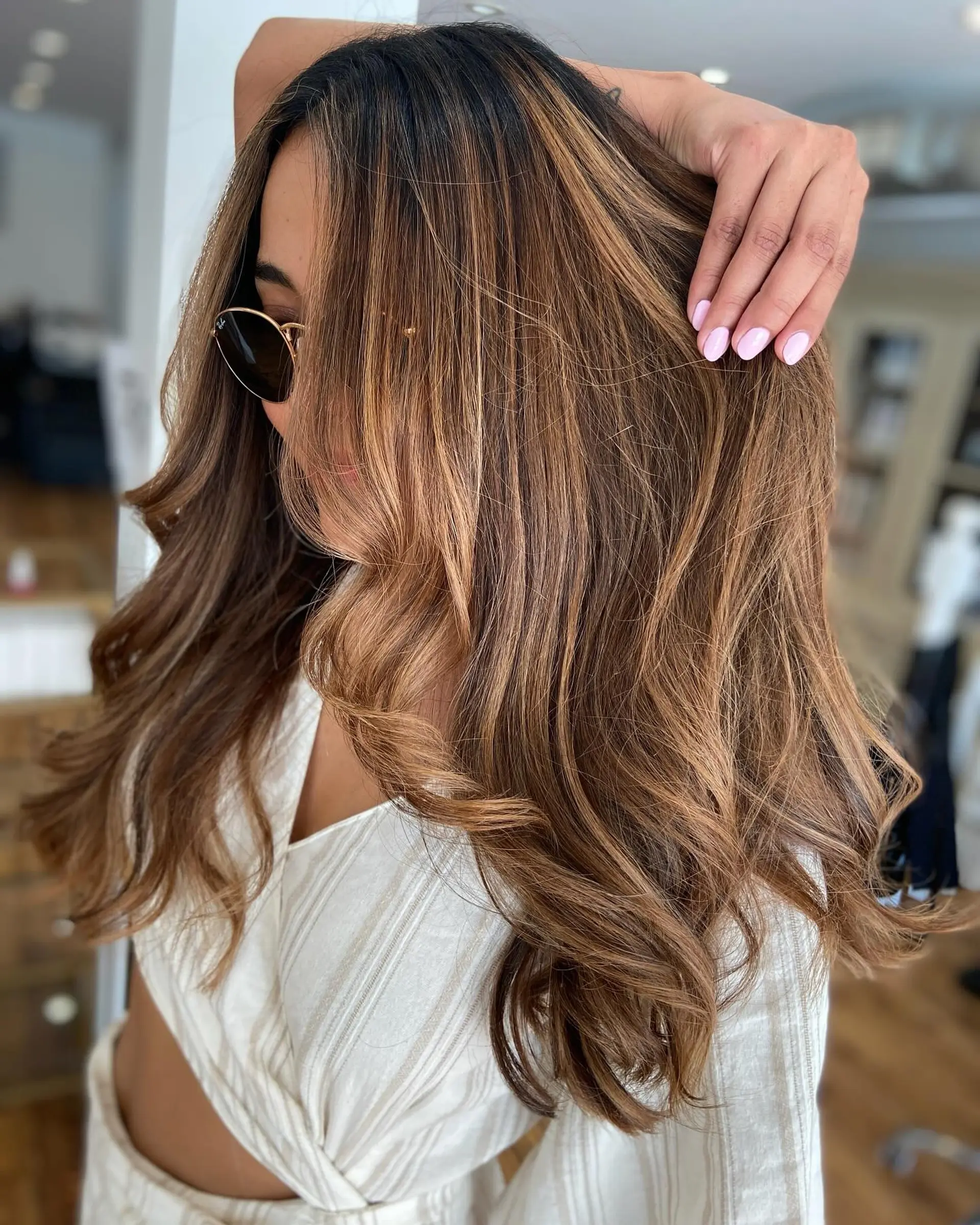 Long, wavy hair with a layered bronde balayage. 1