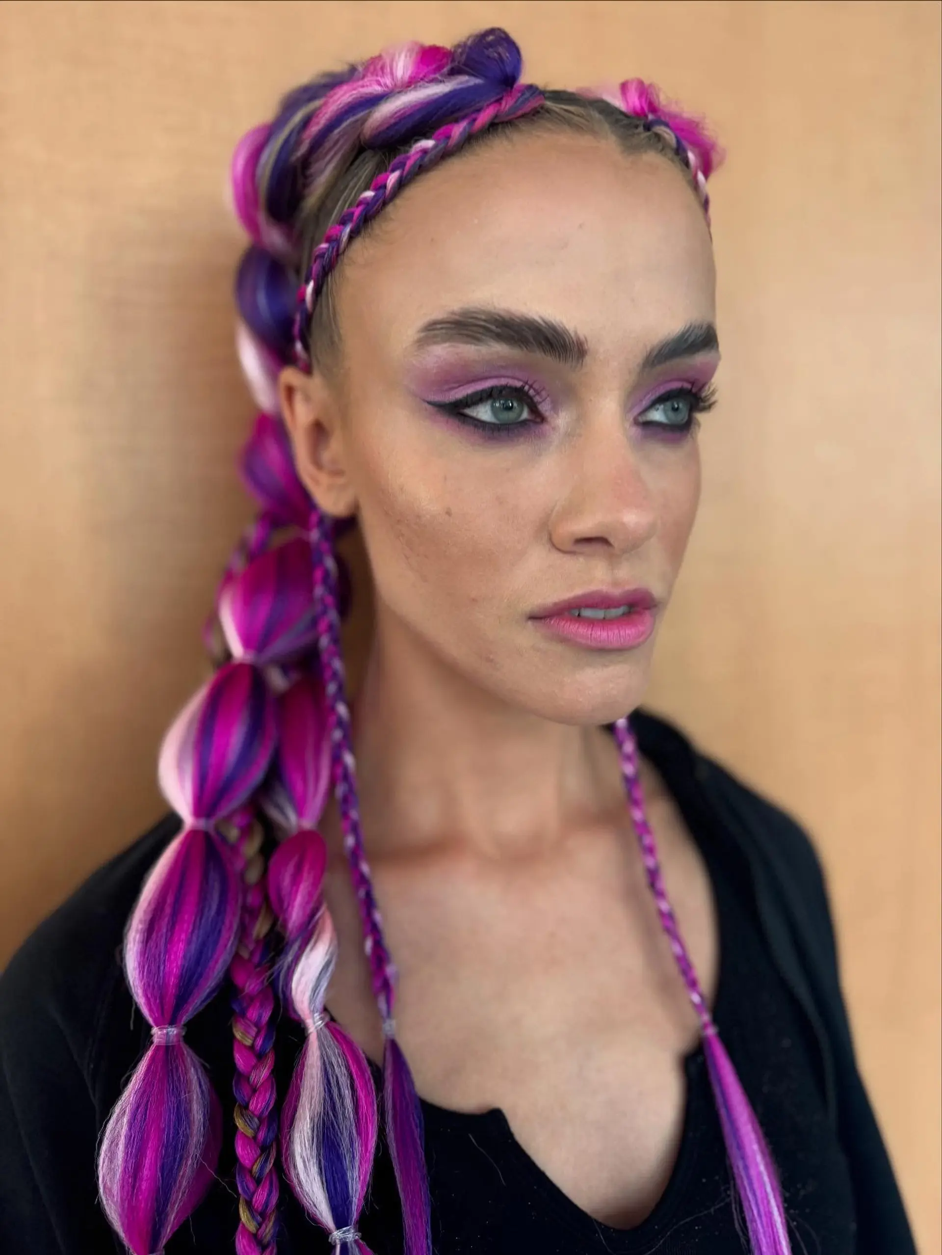 Vibrant festival bubble braids and mini accent braids incorporated with vivid magenta, purple, and pastel pink hair extensions. 1