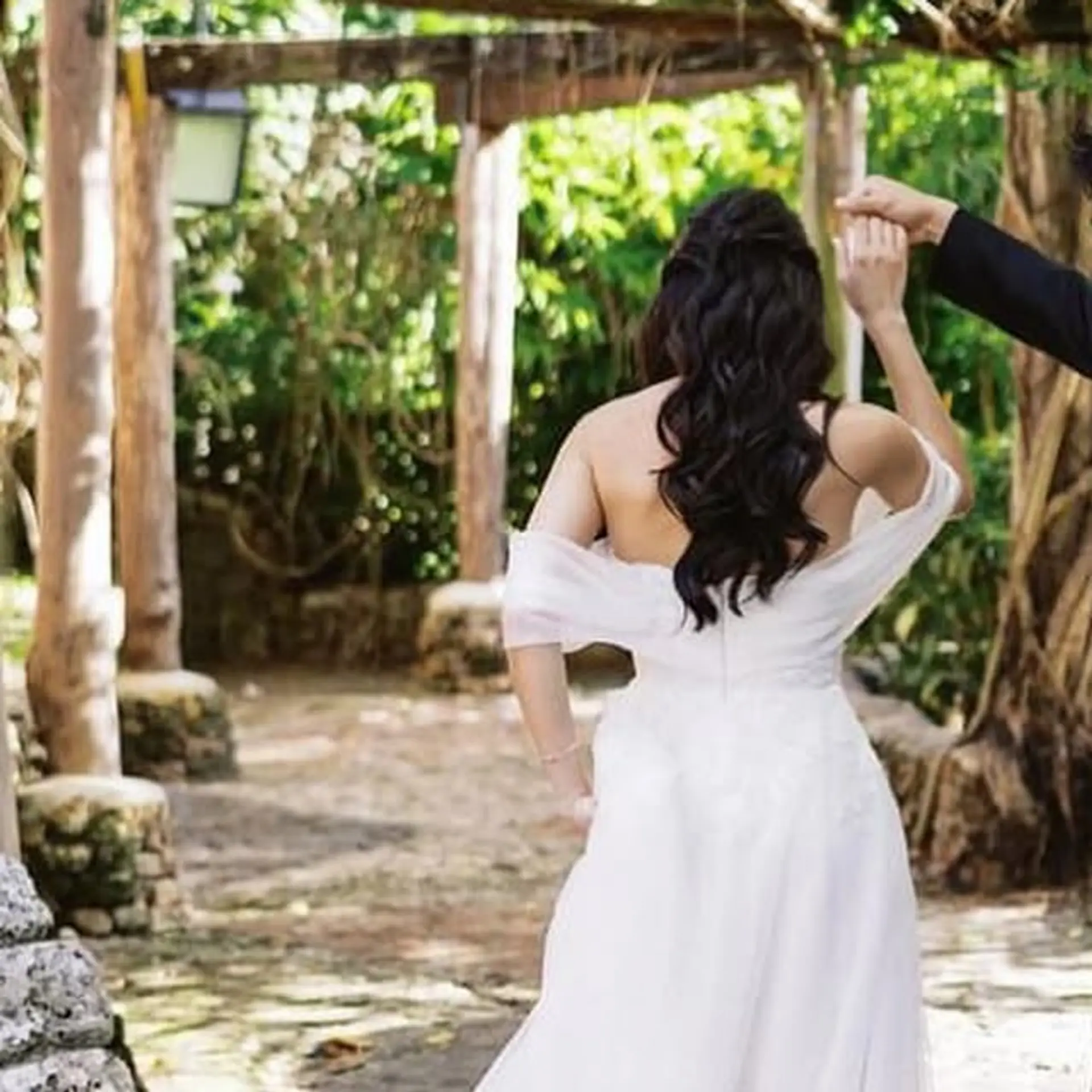 Elegant half-updo with soft waves for a romantic and formal look. 1