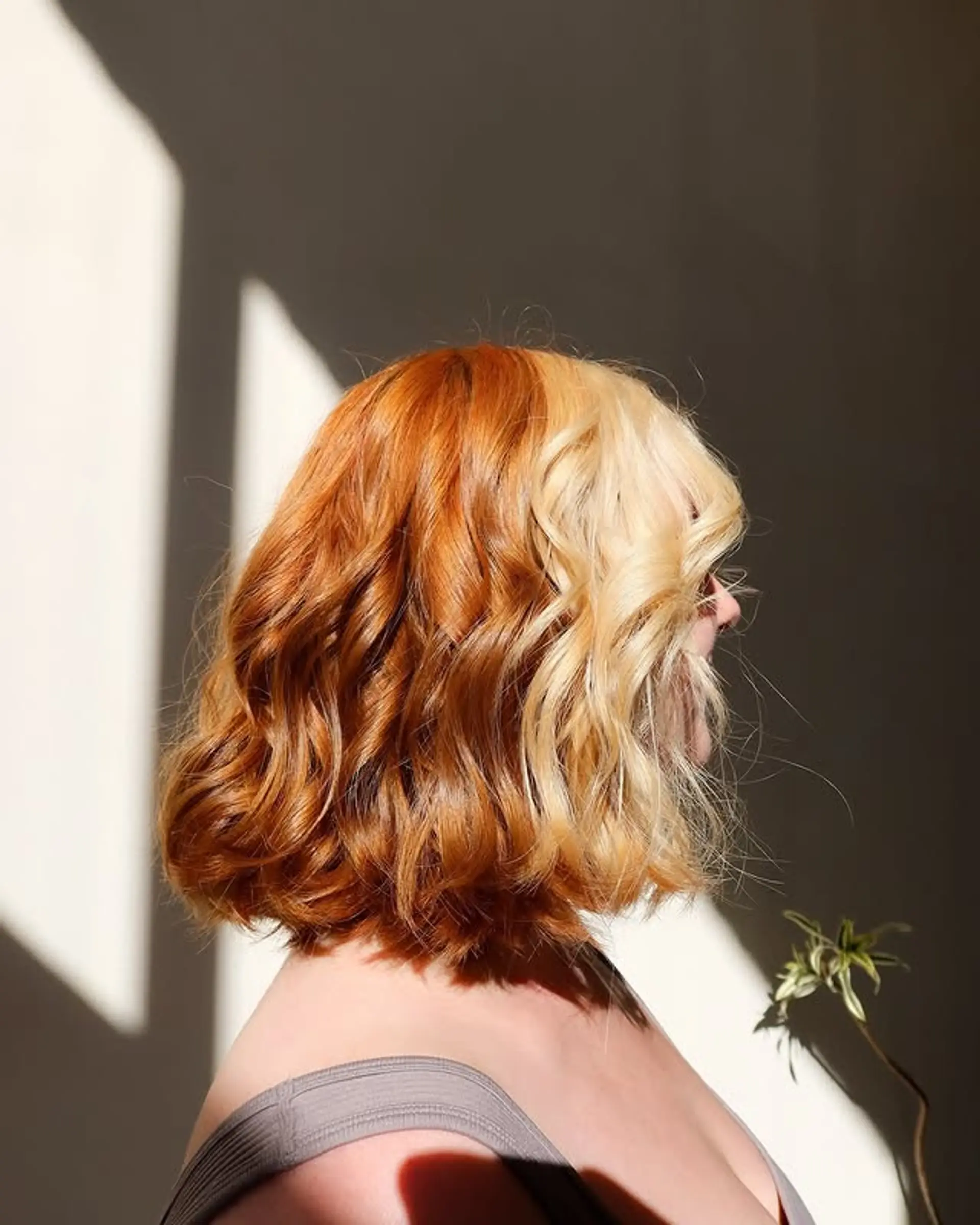 Wavy bob with a bold copper and blonde color block. 1