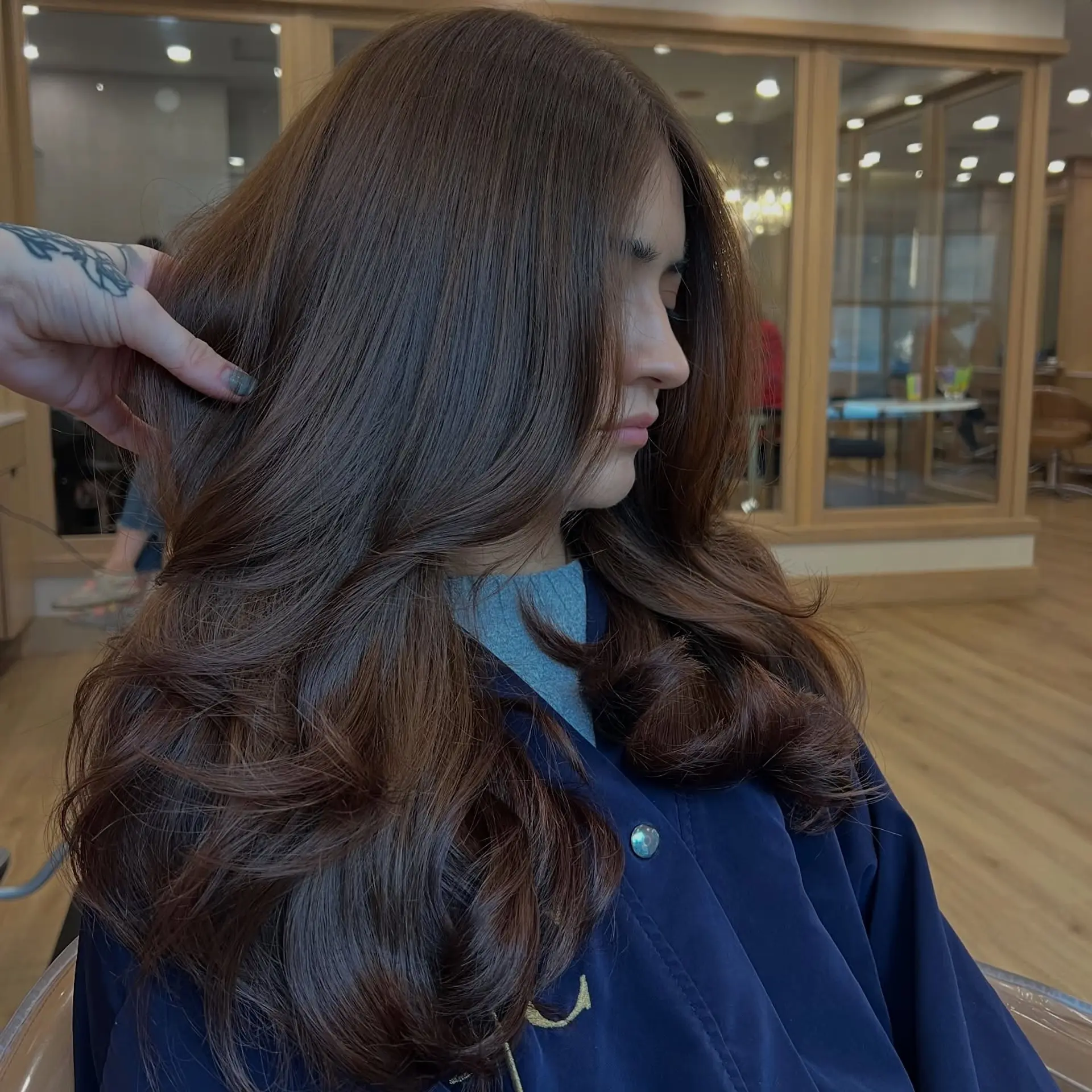 A long, wavy hairstyle with a voluminous blowout and subtle layers. 1
