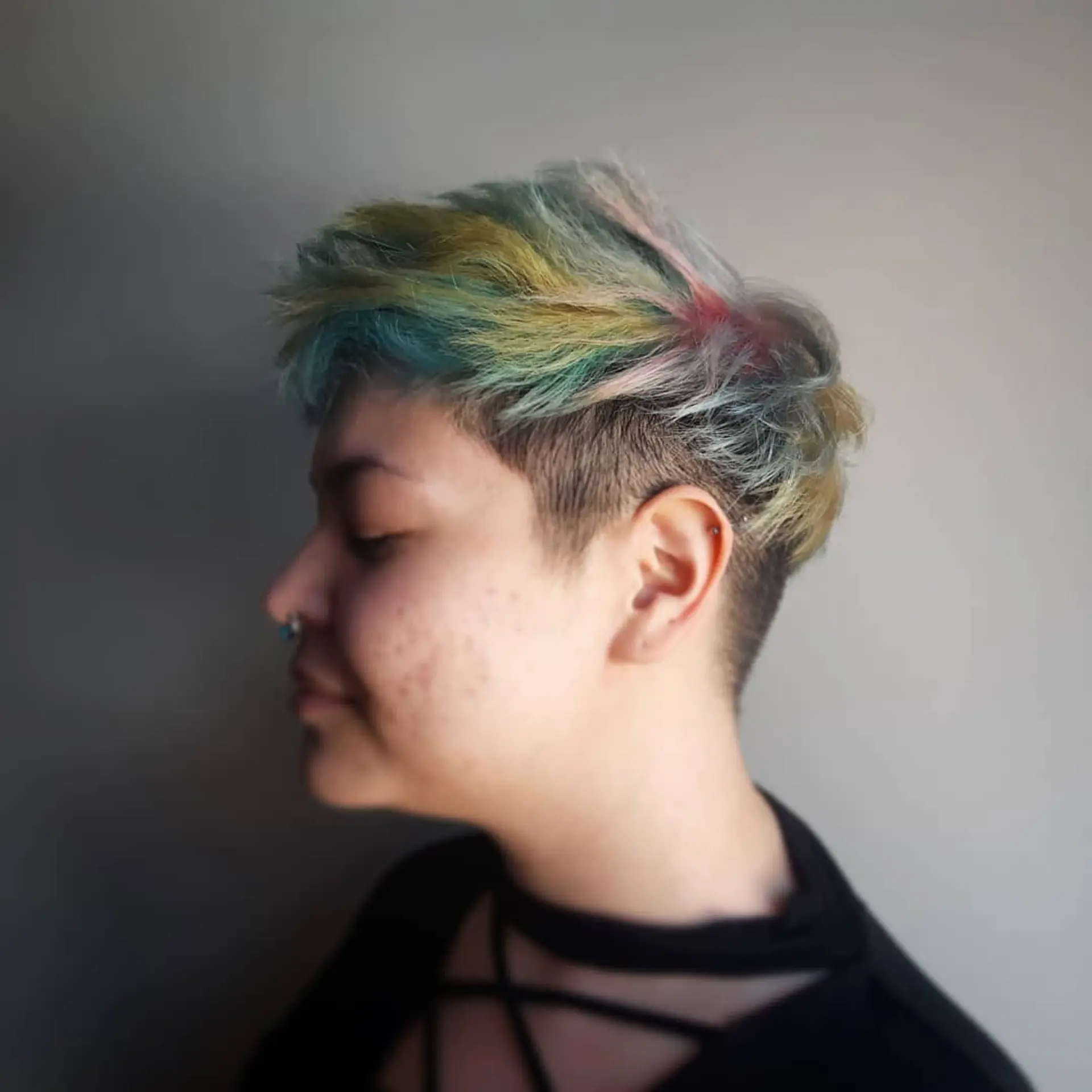 A short undercut with a mix of vibrant pastel highlights. 1