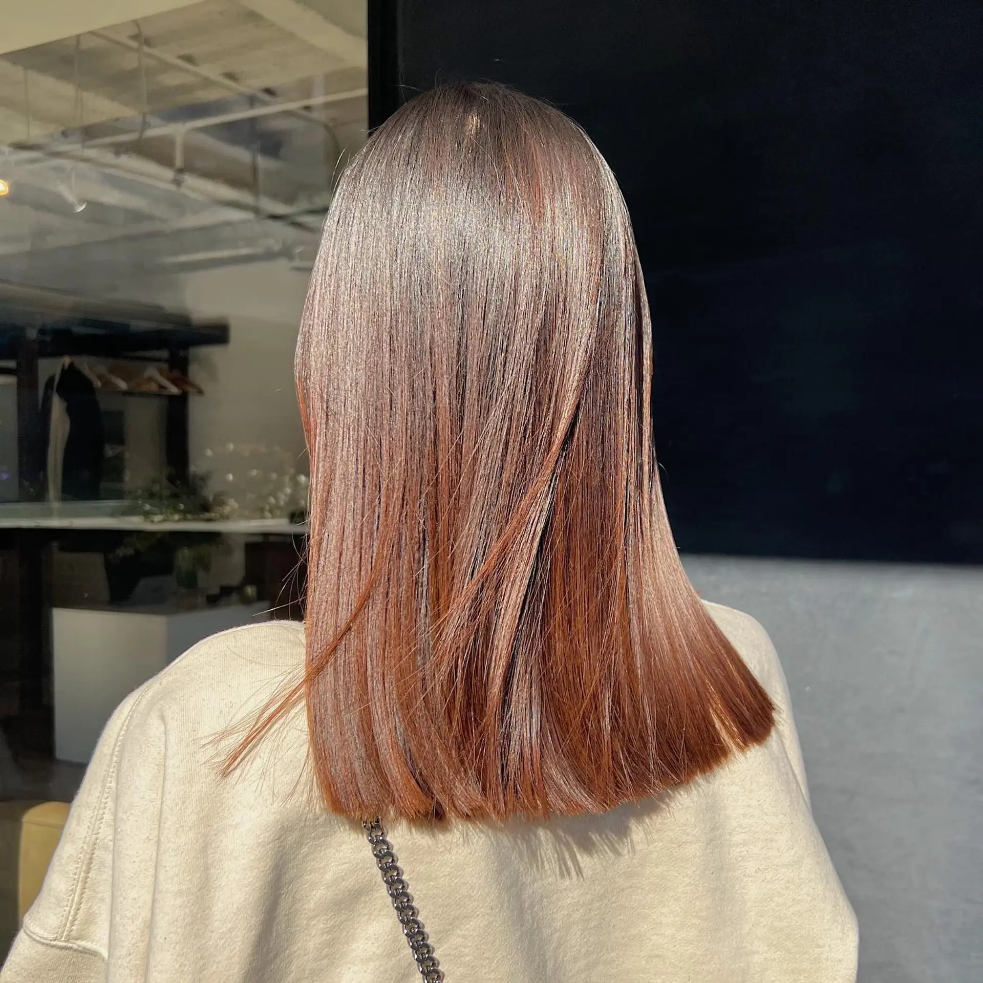 A sleek and modern lob with a stunning copper ombre effect. 1