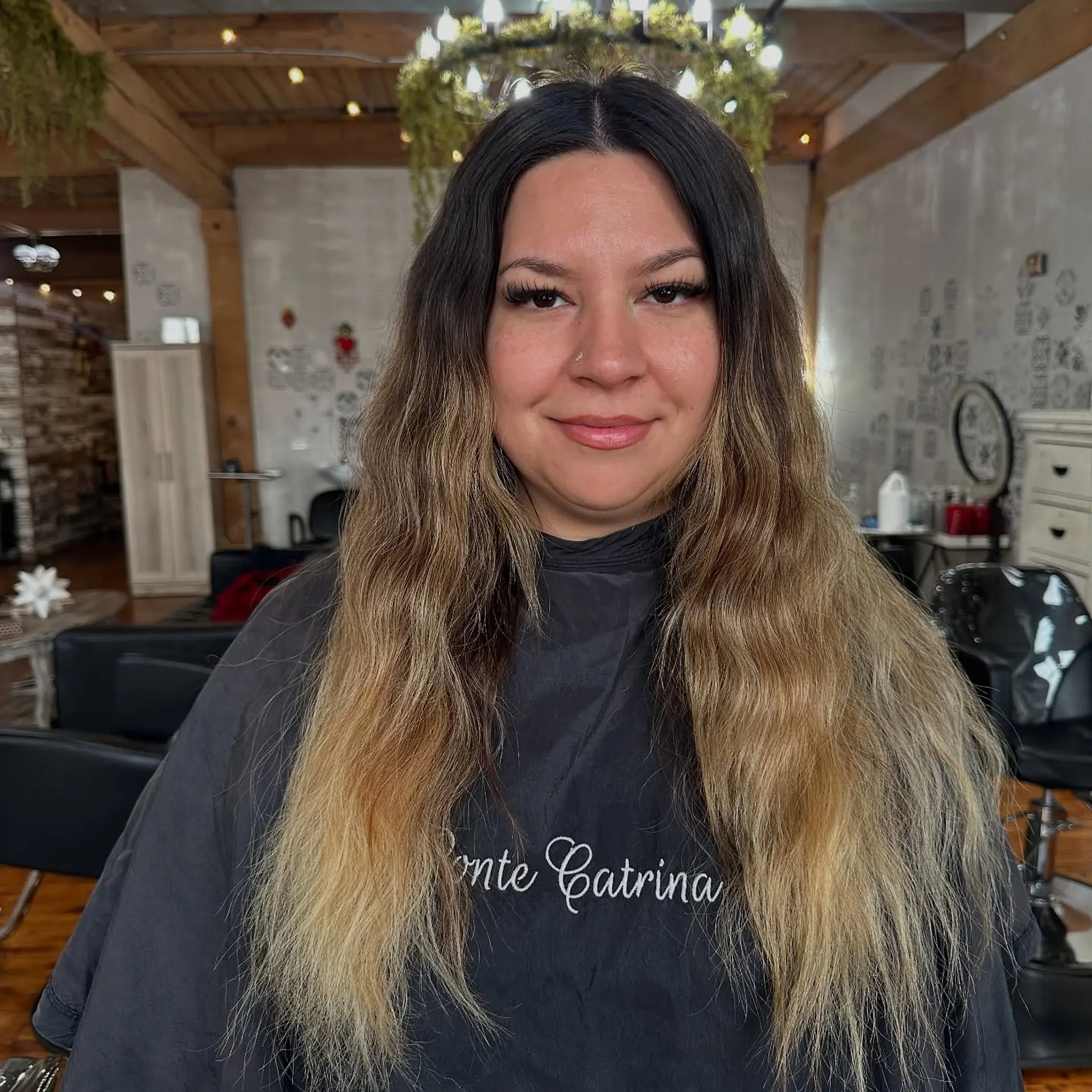 This is a layered medium-length hairstyle with bronde coloring that is perfectly styled. 2