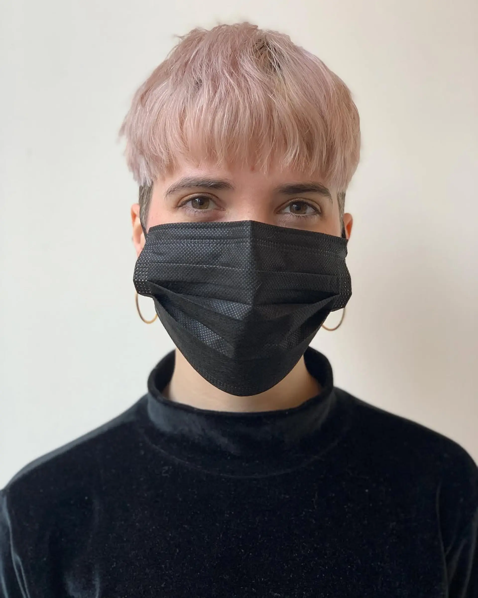 A chic lavender pixie with a textured fringe, pastel tones, and short layers, offering an edgy yet soft aesthetic. 2