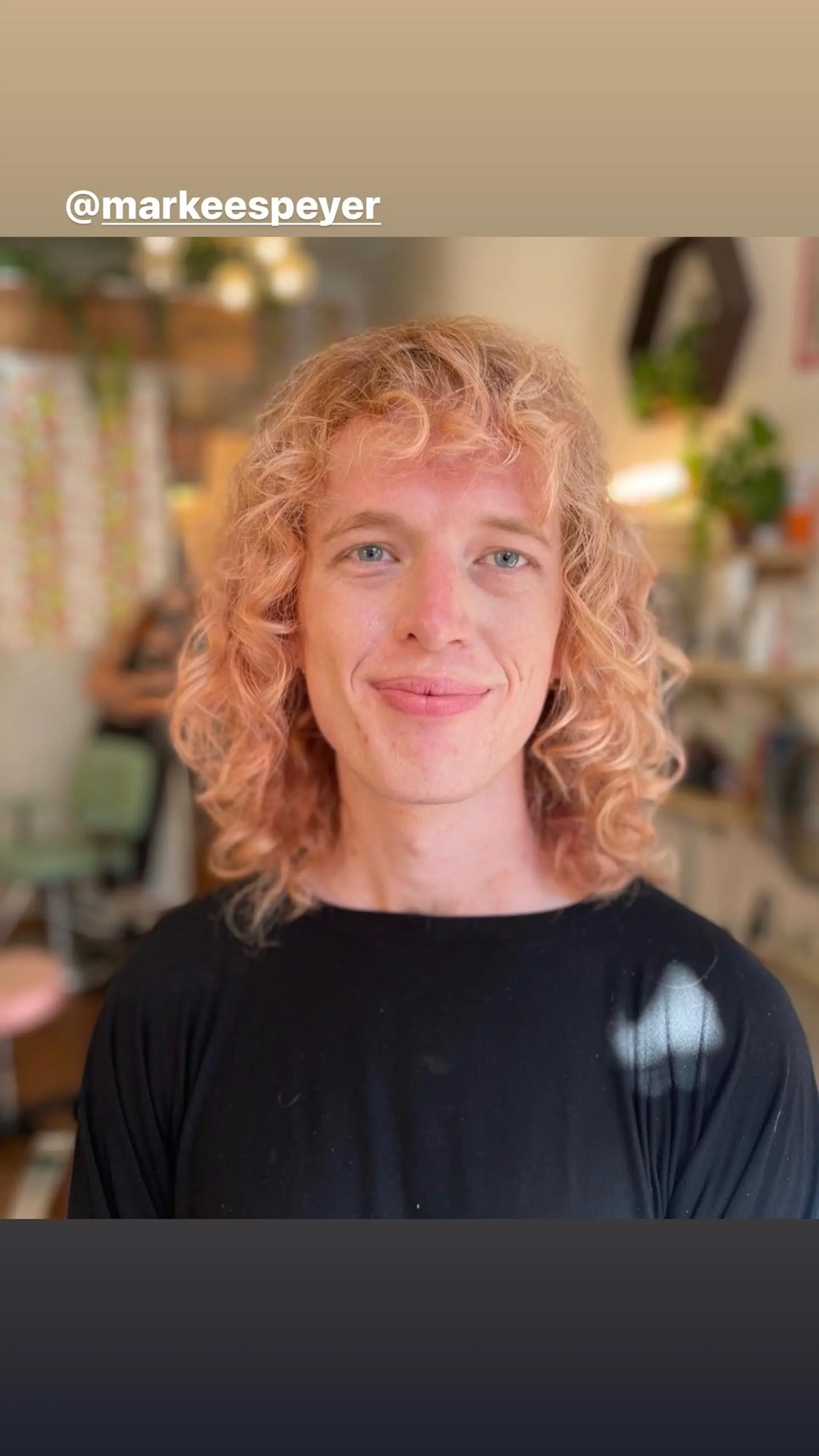 A textured shag haircut with curly bangs. 1