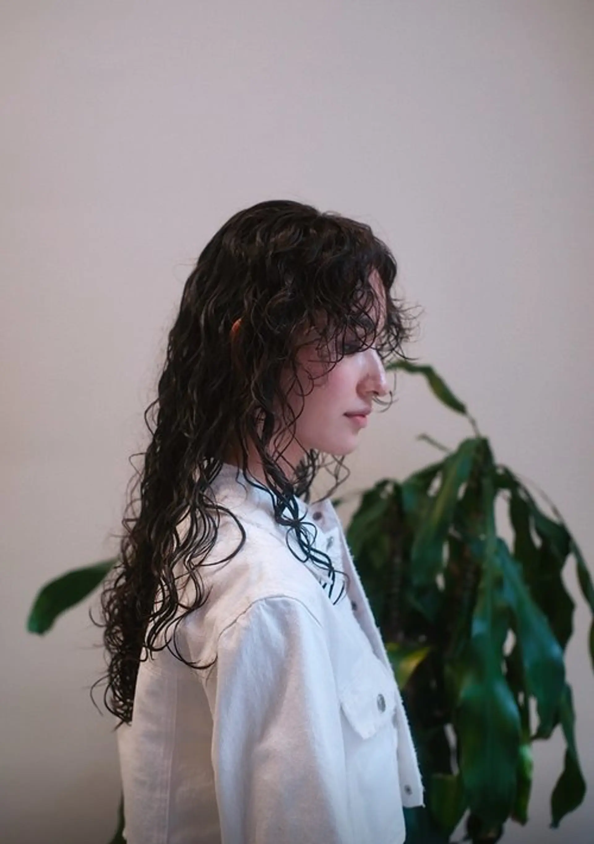 Long, defined curls with a wet look finish. 1