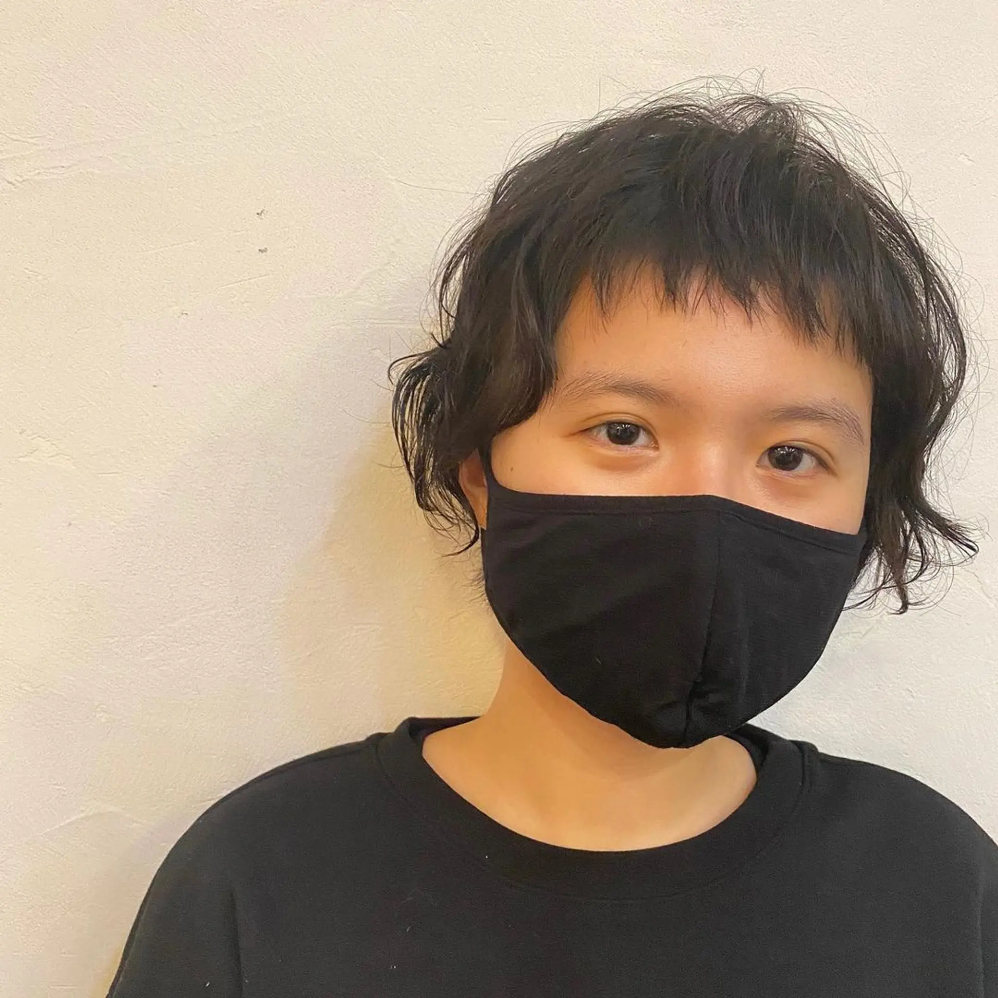 The hairstyle features a tousled pixie cut with a casual, carefree look. The texture is naturally wavy, adding volume and movement to the short length. (Hair by Coco) 2