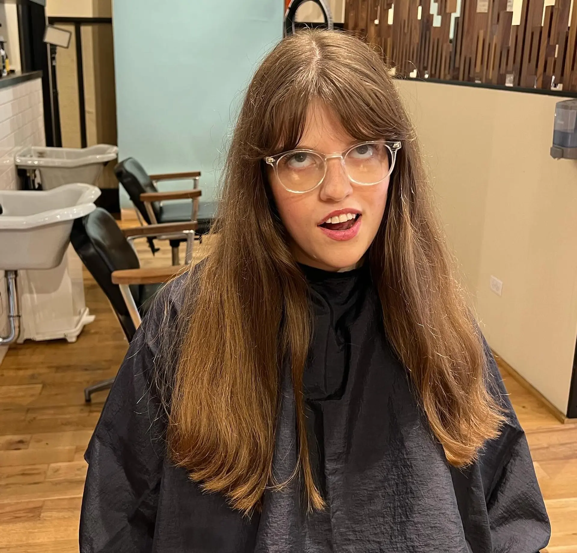 A short, textured pixie cut. 2