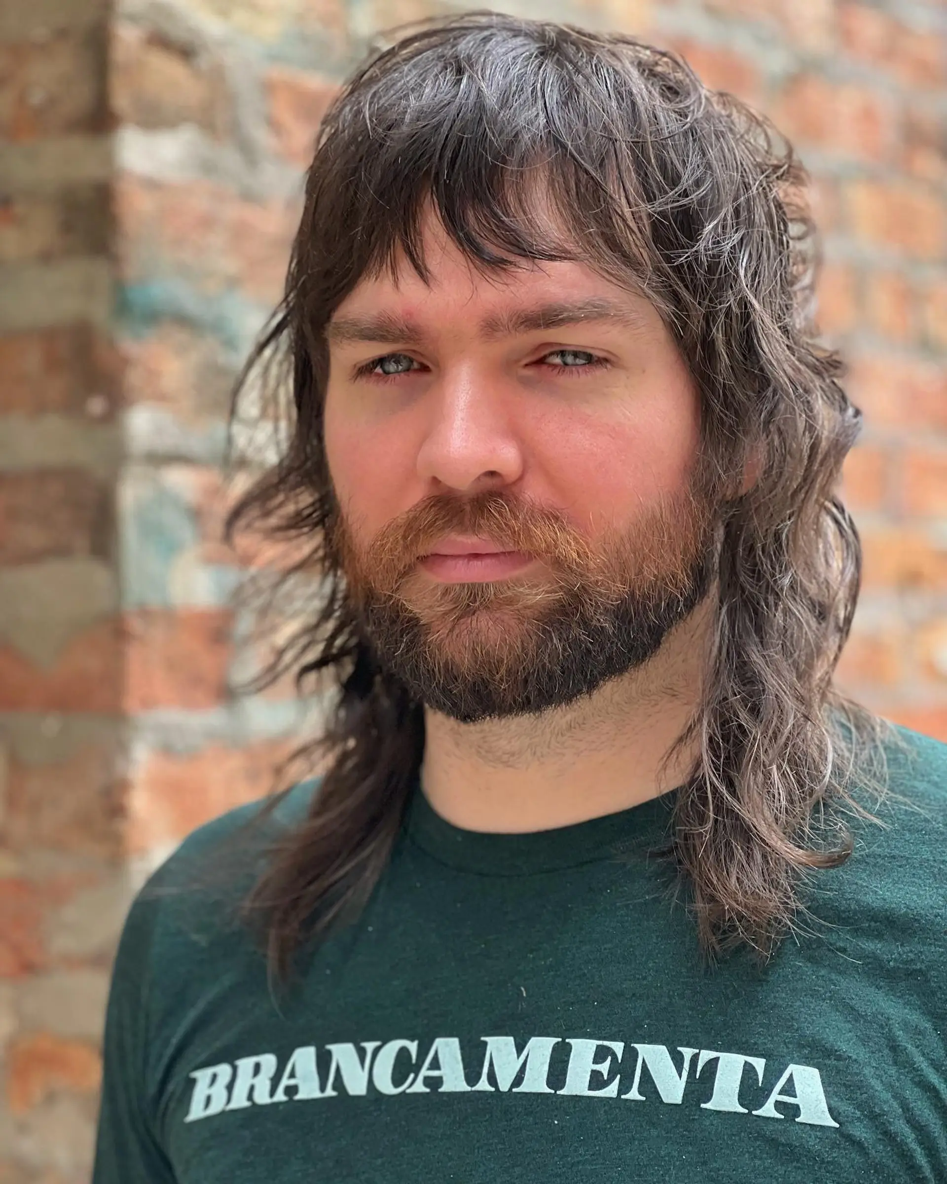 A textured, layered shag mullet with modern flair. 1