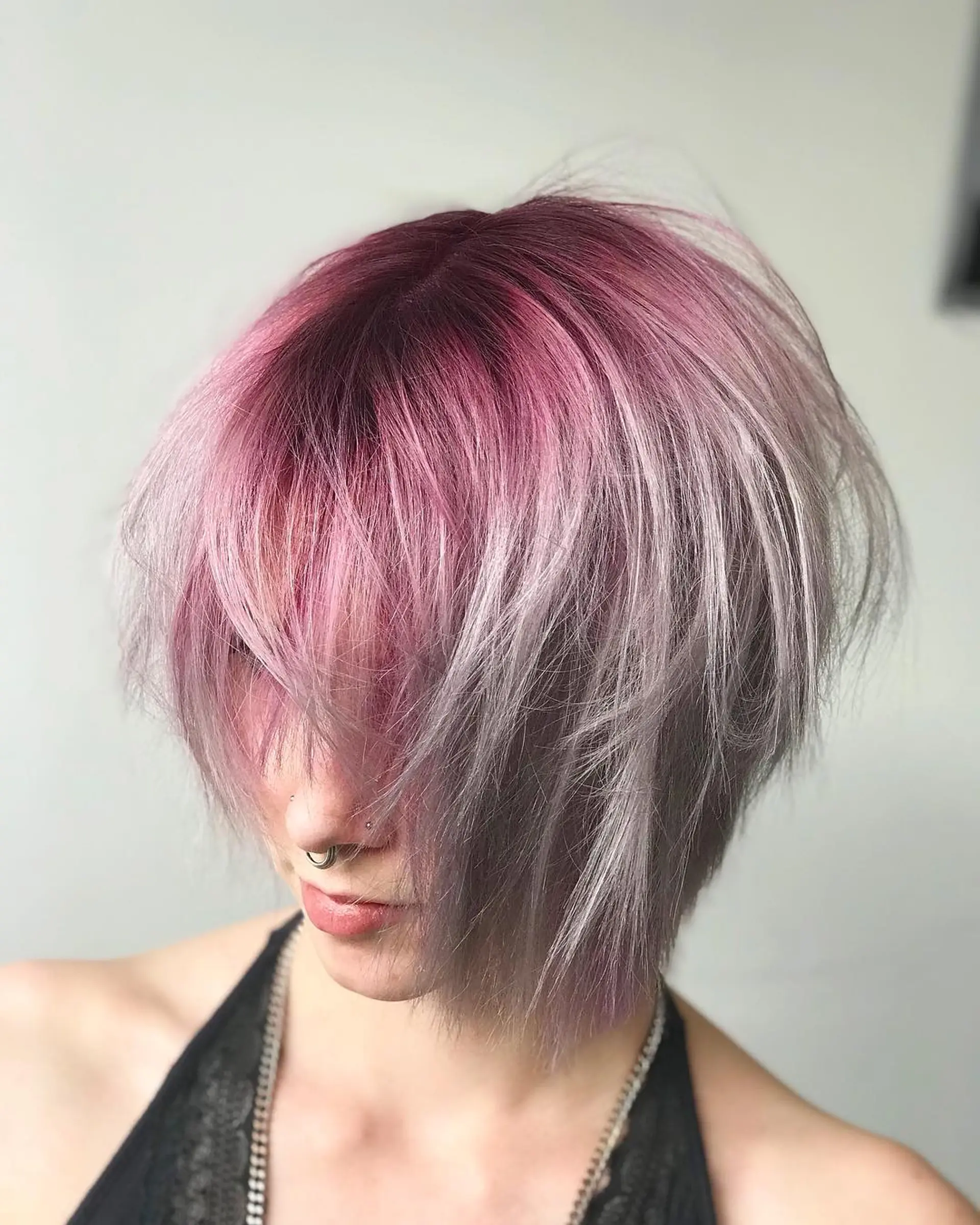 Bringing back one of my first colors and still one of my favorite razor cuts ✂️ dark amethyst shadow root blended with a Smokey silver a hidden lilac panel 1