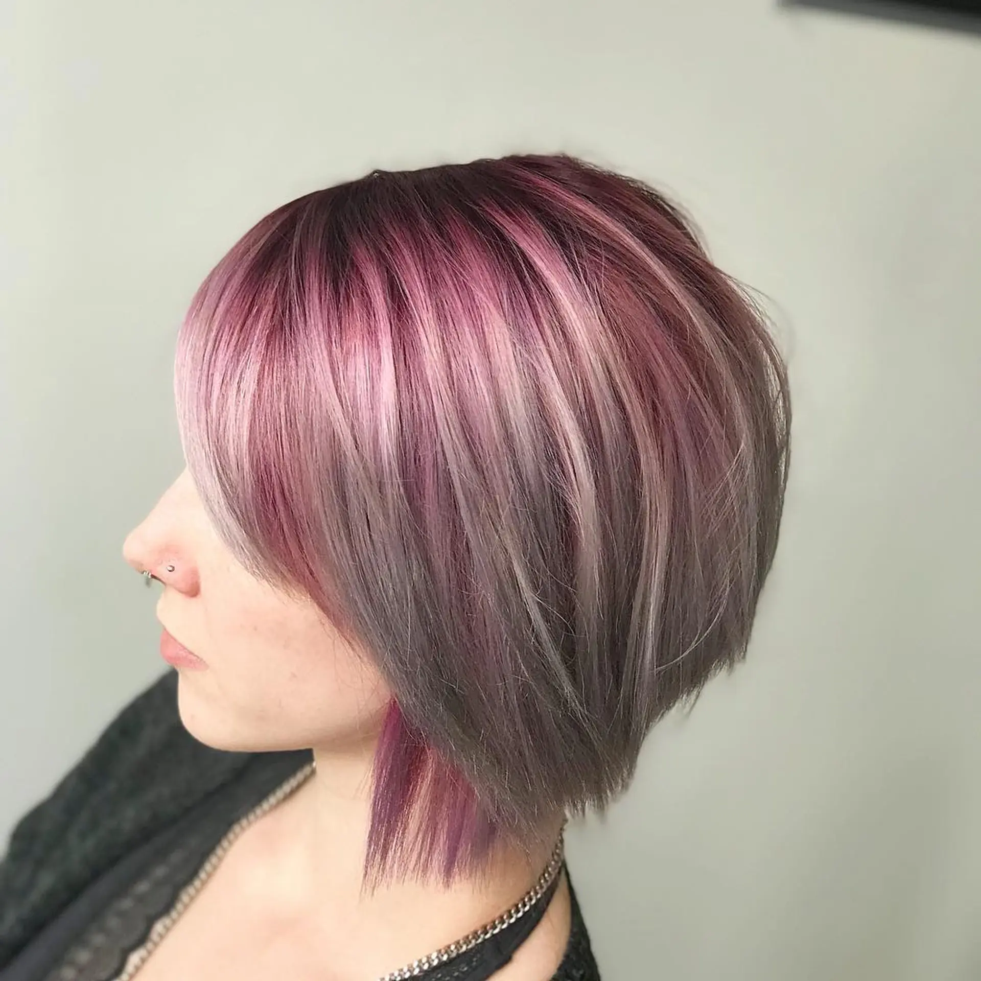 Bringing back one of my first colors and still one of my favorite razor cuts ✂️ dark amethyst shadow root blended with a Smokey silver a hidden lilac panel 2