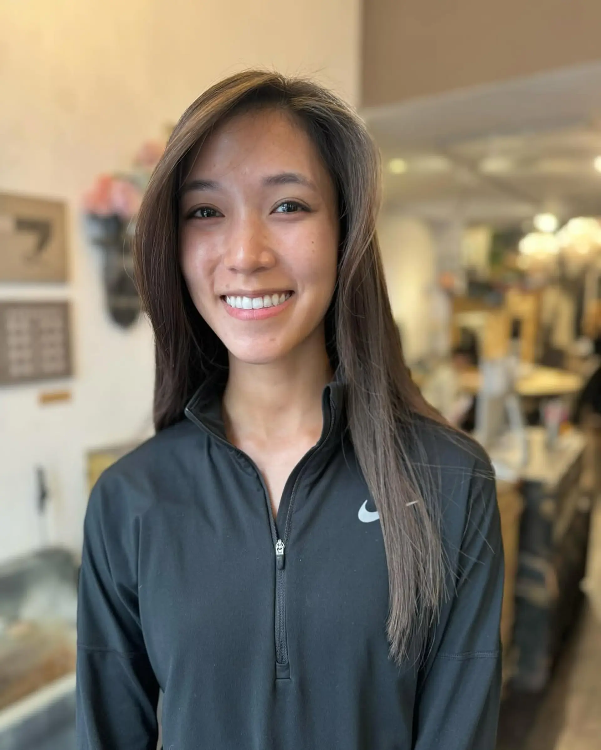 Extremely straight, very long dark brown hair with ultra-smooth, silky texture and minimal layers, giving a sleek and elegant appearance. 5