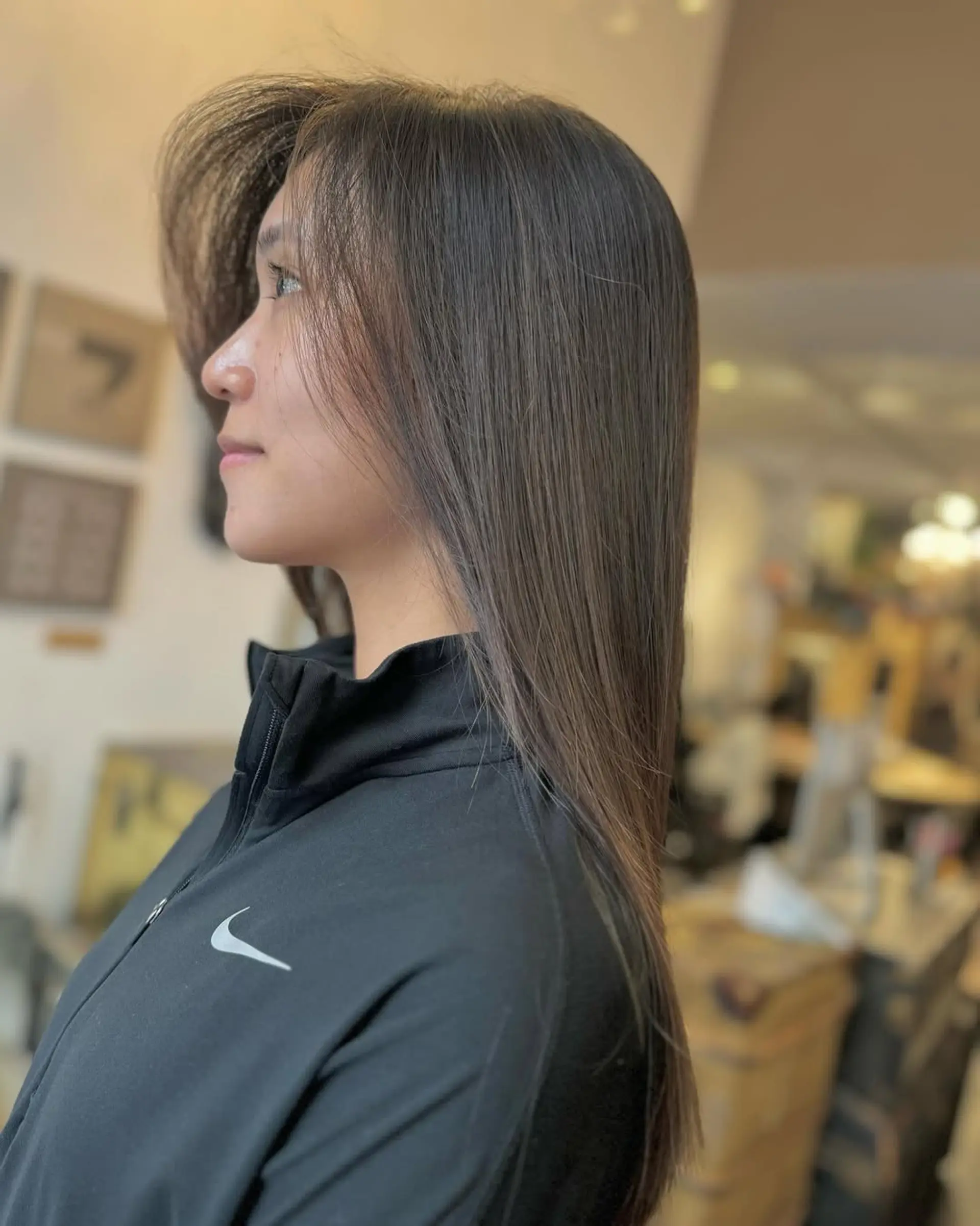 Extremely straight, very long dark brown hair with ultra-smooth, silky texture and minimal layers, giving a sleek and elegant appearance. 6