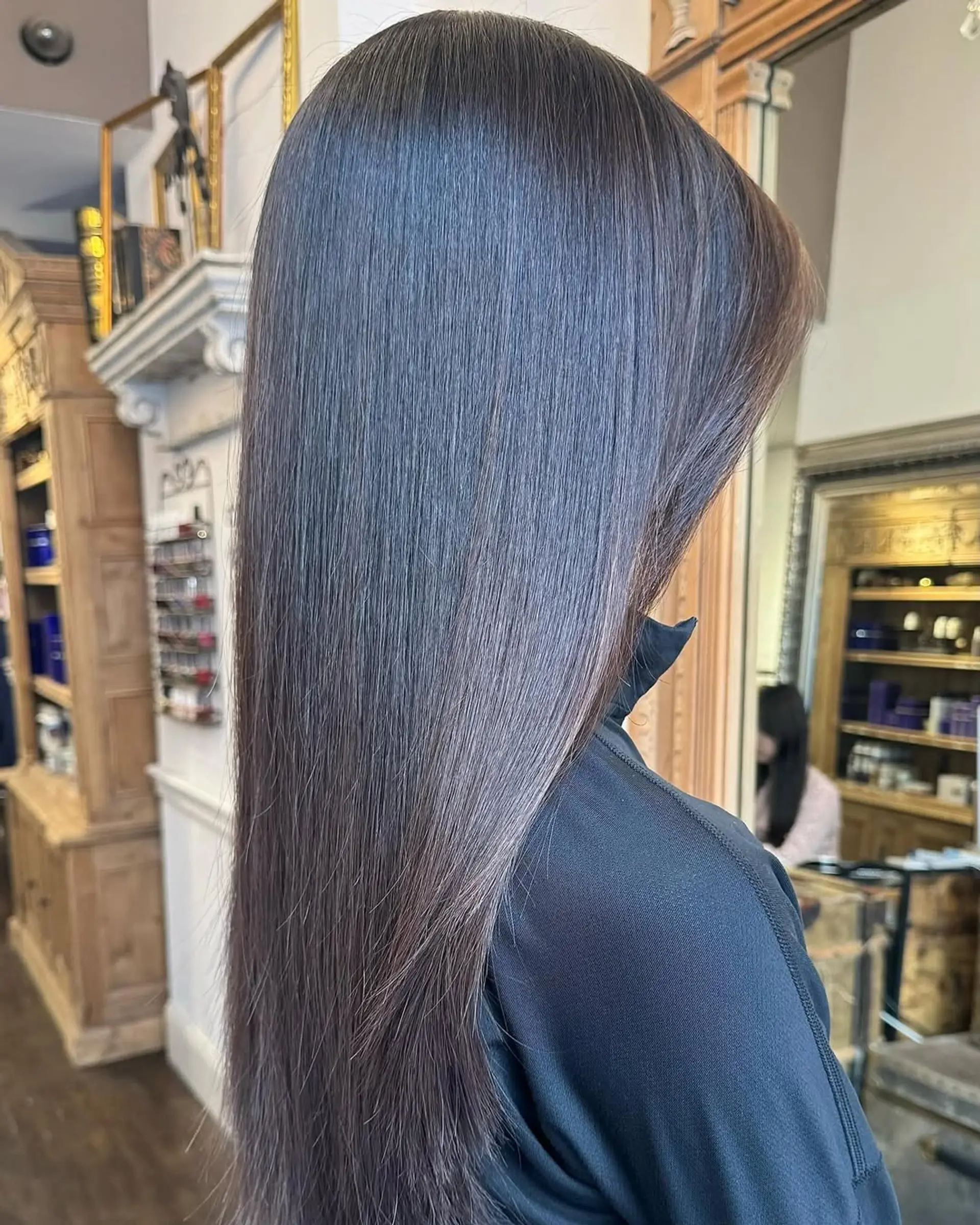Extremely straight, very long dark brown hair with ultra-smooth, silky texture and minimal layers, giving a sleek and elegant appearance. 3