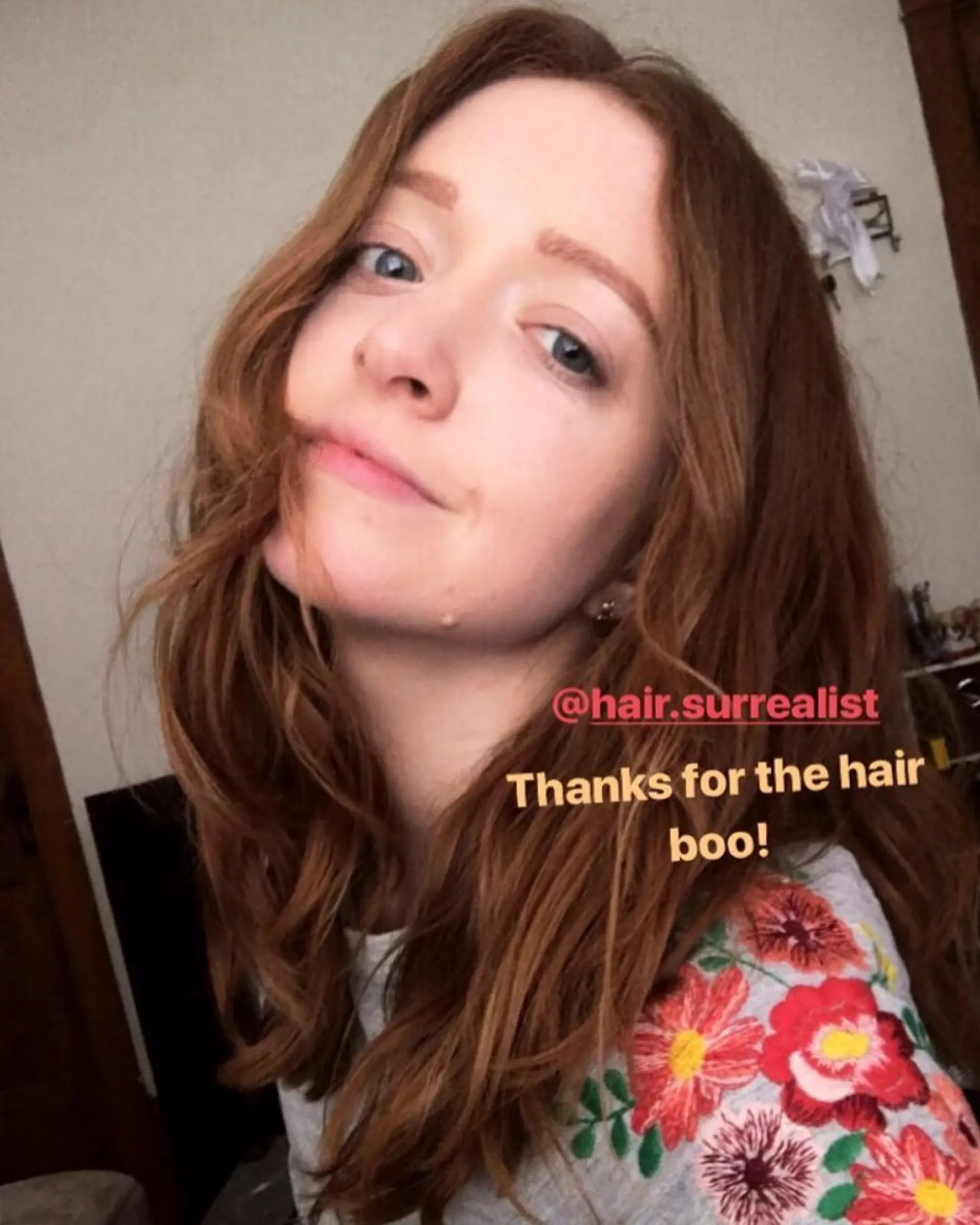 Long, layered wavy hairstyle with romantic waves. 1