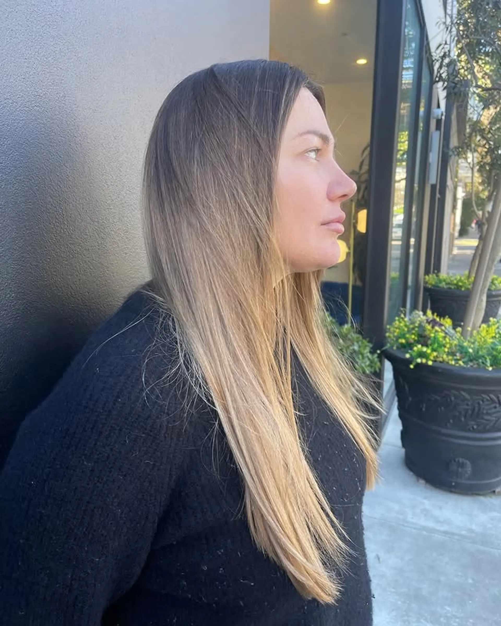 Long layered hairstyle with a bronde balayage. 1