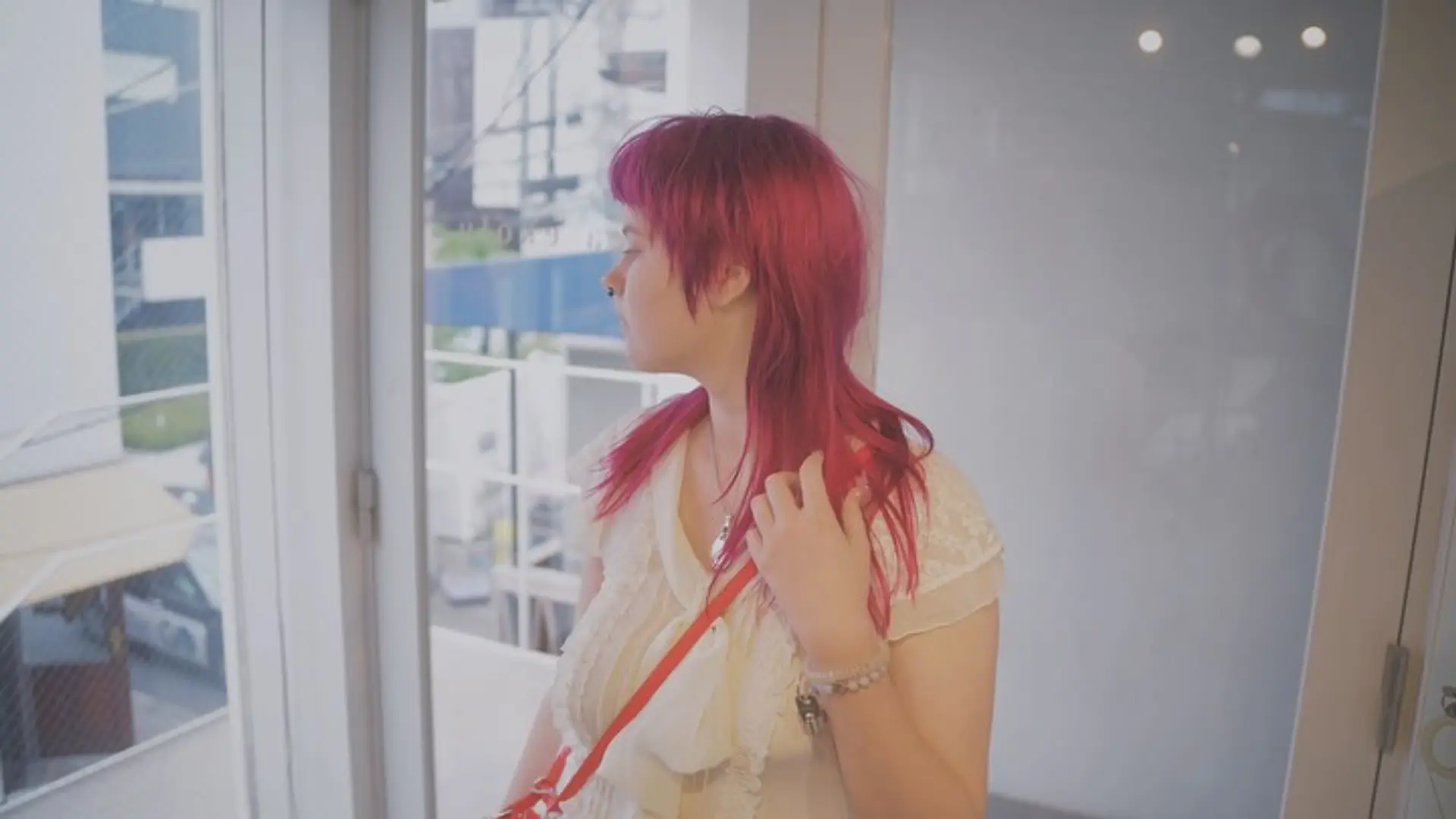 A vibrant magenta shag mullet featuring choppy micro bangs and heavily textured, feathered layers. 1