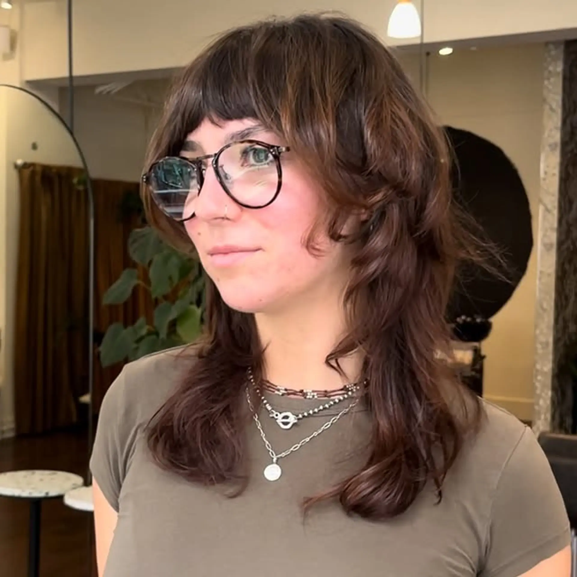 A textured shag with layered curtain bangs. 1