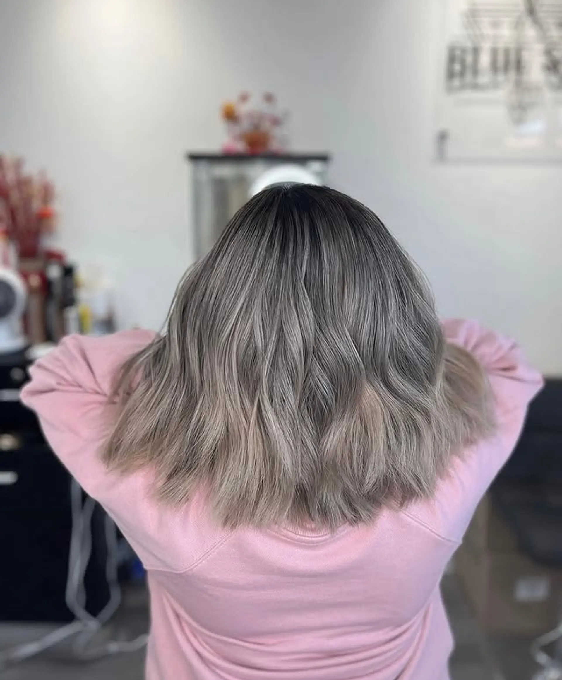 A trendy and low-maintenance wavy lob with layers for a voluminous, effortless look. 1