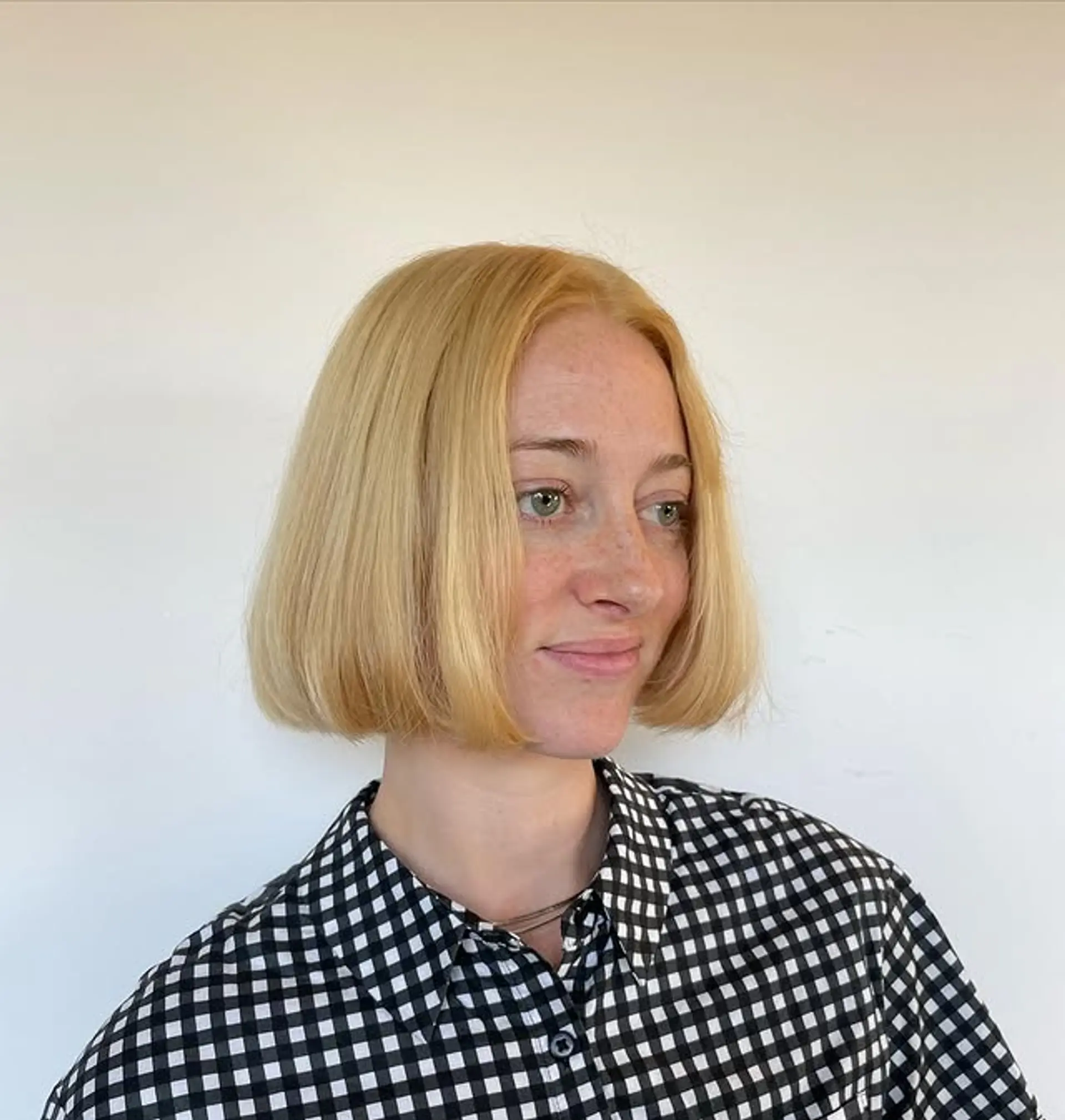 A chic, blunt bob with subtle face-framing. 1