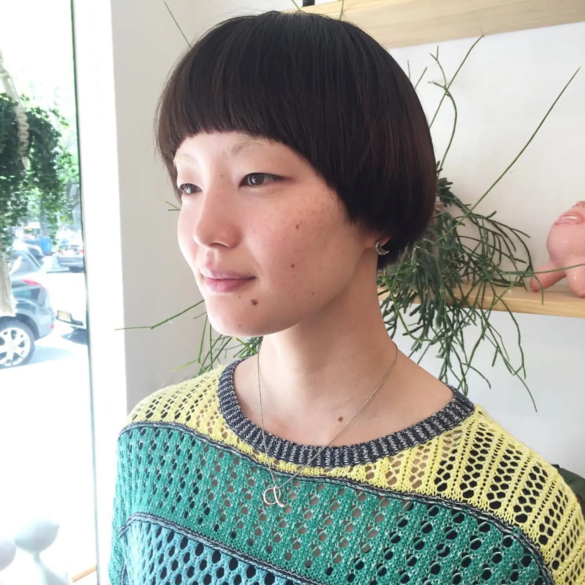 Straight, dark brown hair with a blunt fringe, and an even, rounded shape reminiscent of a classic bowl cut, finished with a textured look. by @takeohair 1