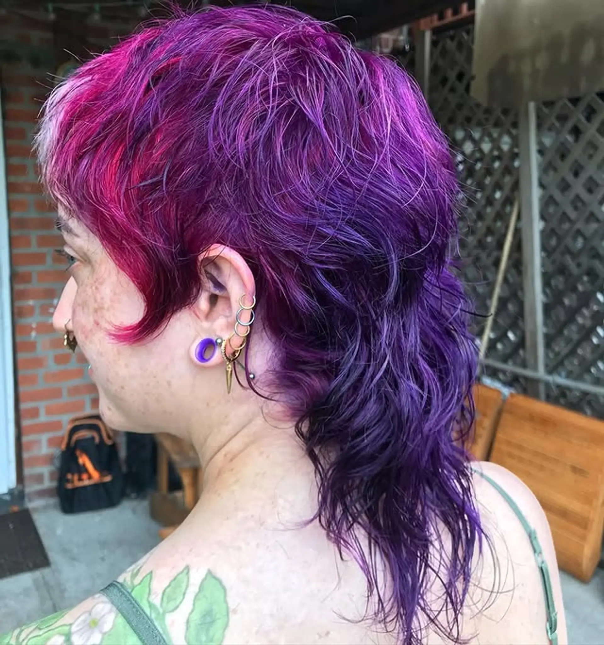 A modern shag mullet with choppy layers and vibrant color blocking. 1