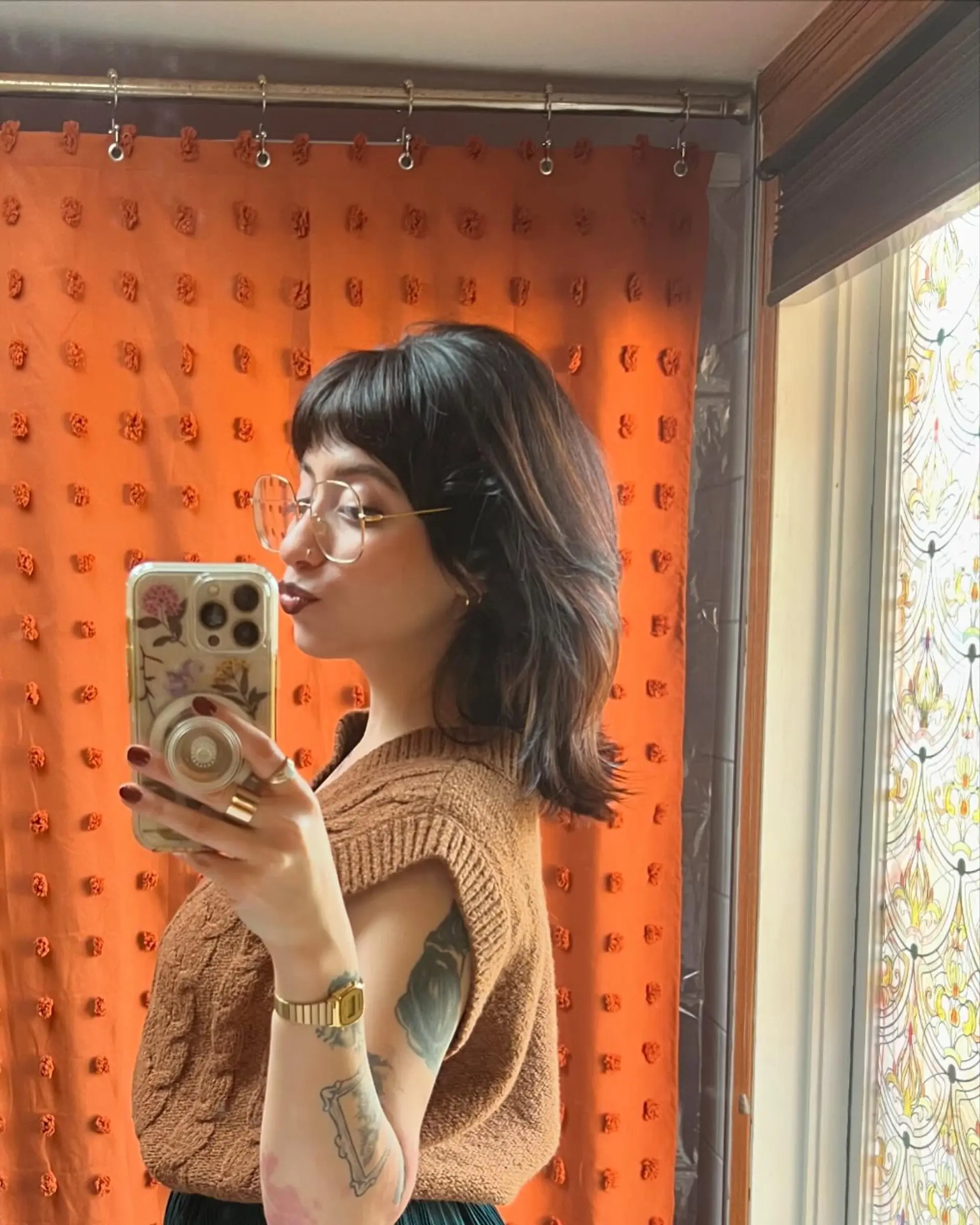 A short, textured pixie cut with a slightly edgy feel. 2