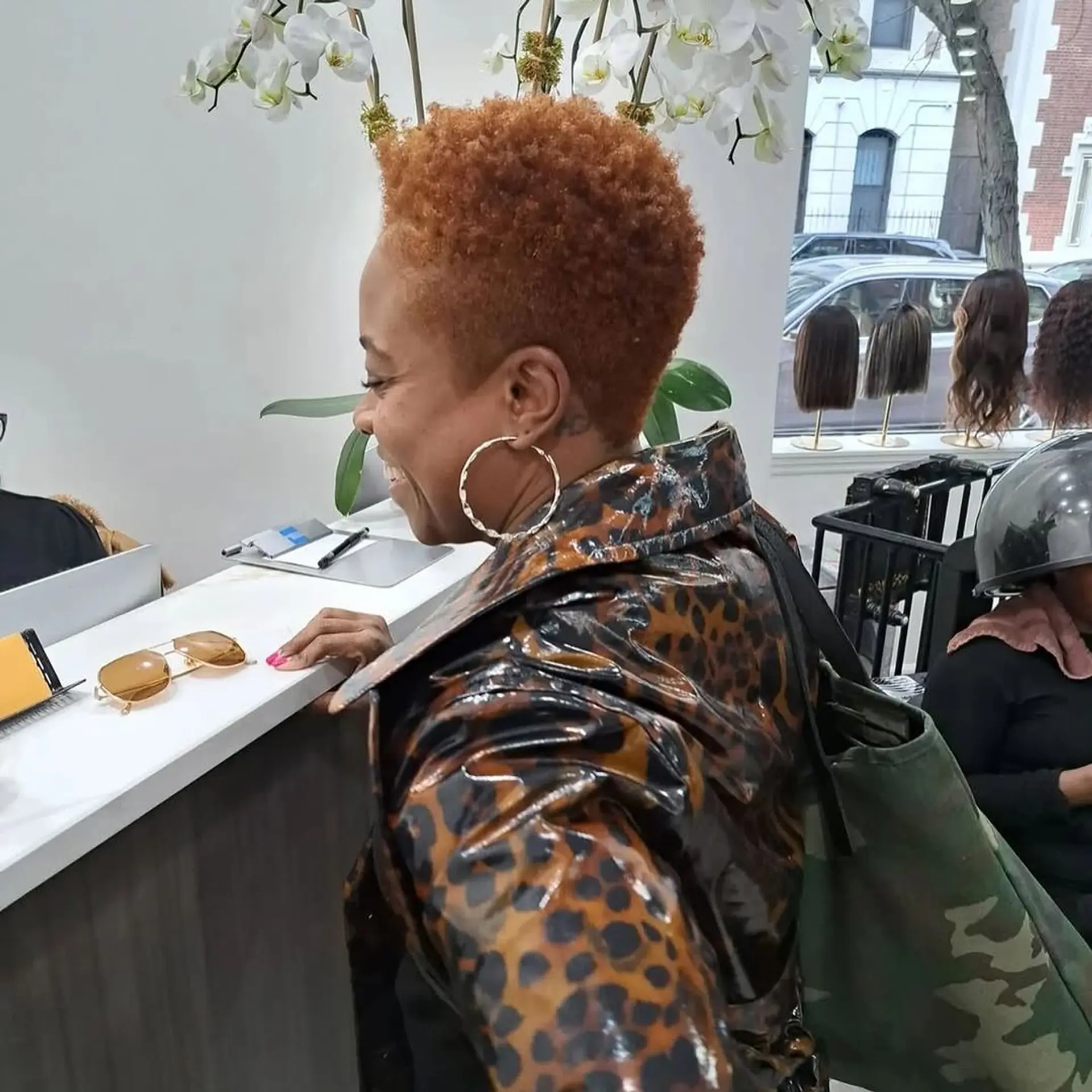 A textured pixie cut with short, defined layers. 2